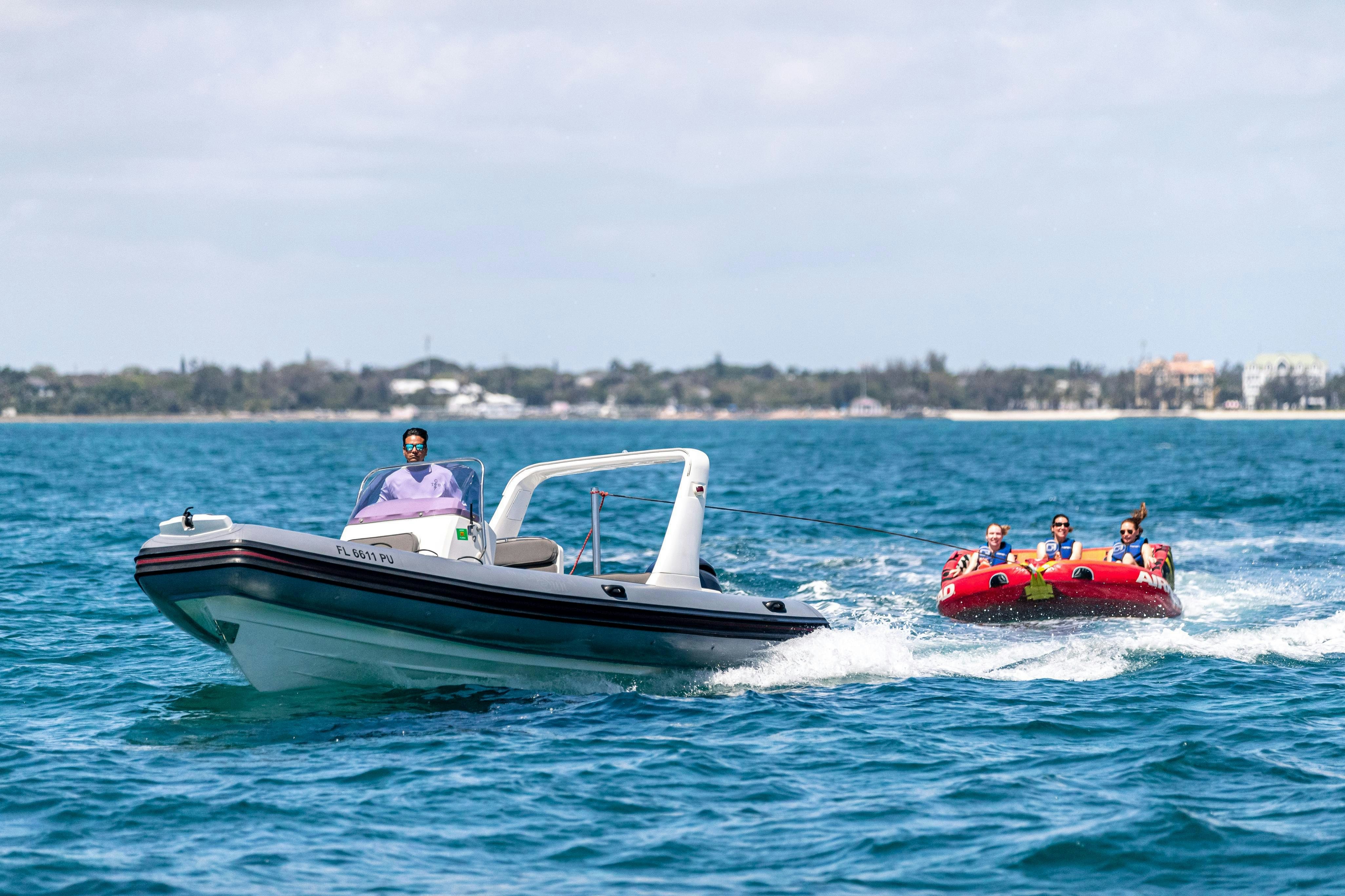 a group of people in a boat aboard TCB Yacht for Charter