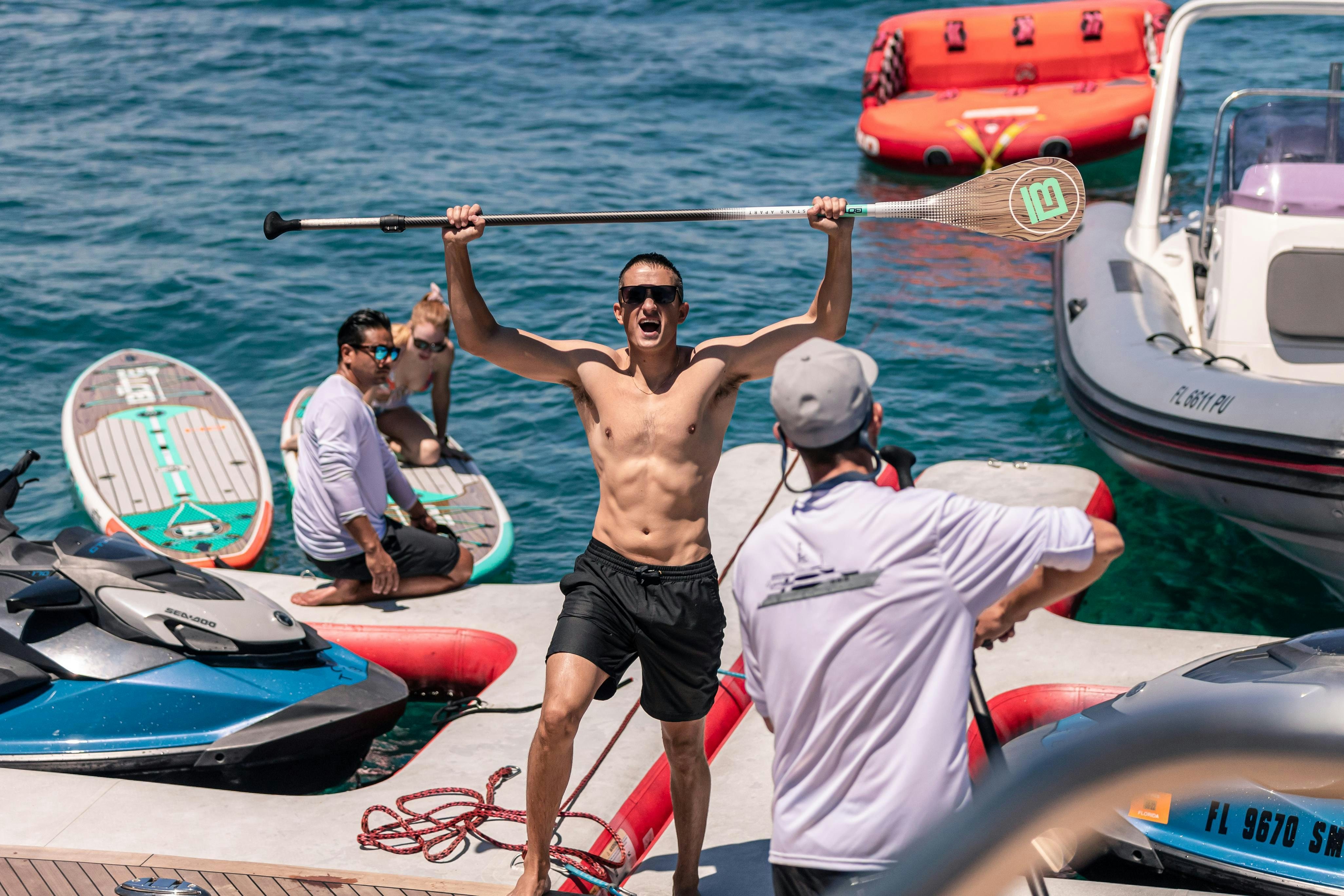 a group of people on a boat aboard TCB Yacht for Charter