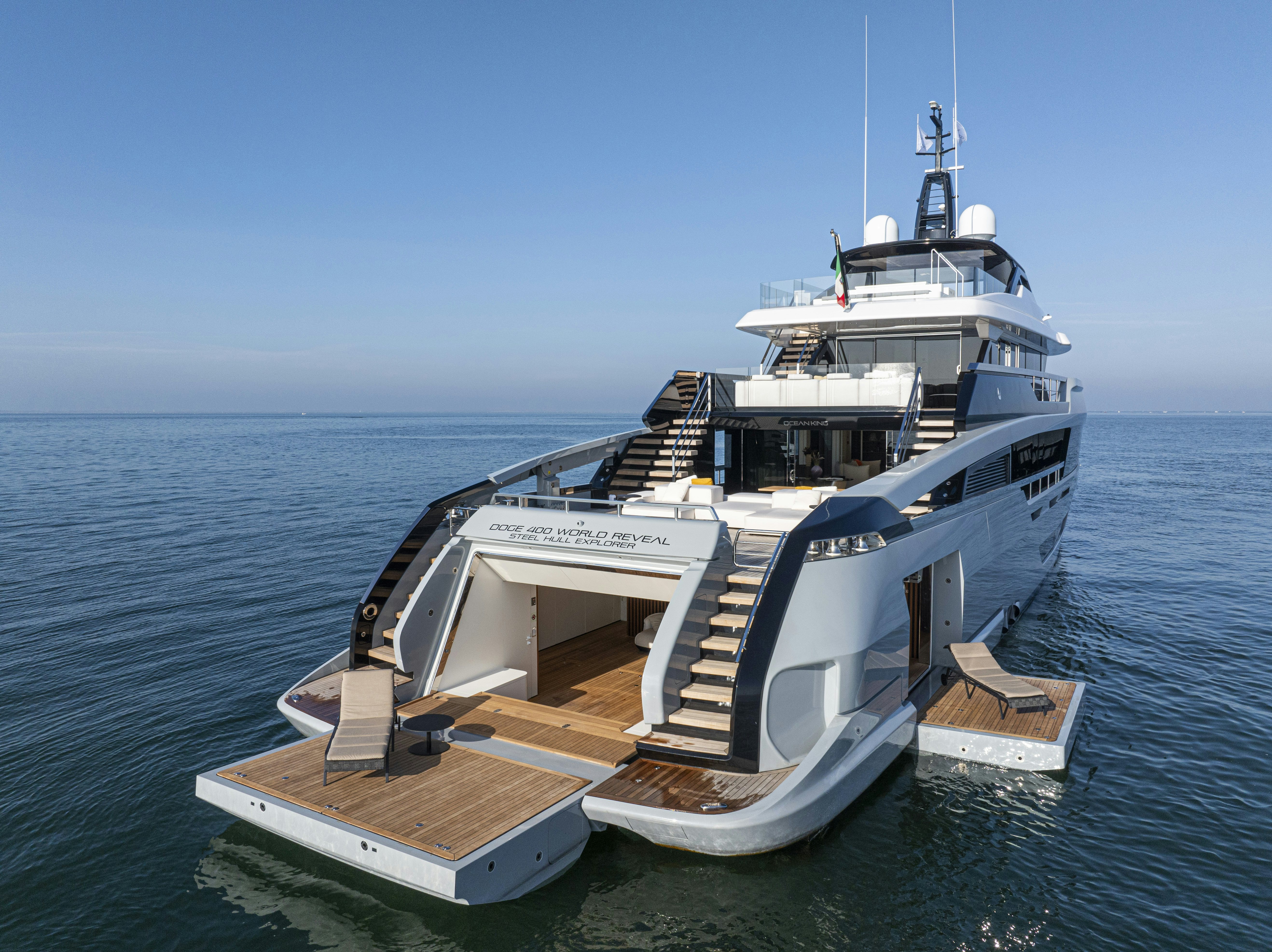 a large white boat in the water aboard OCEAN KING DOGE 400 Yacht for Sale