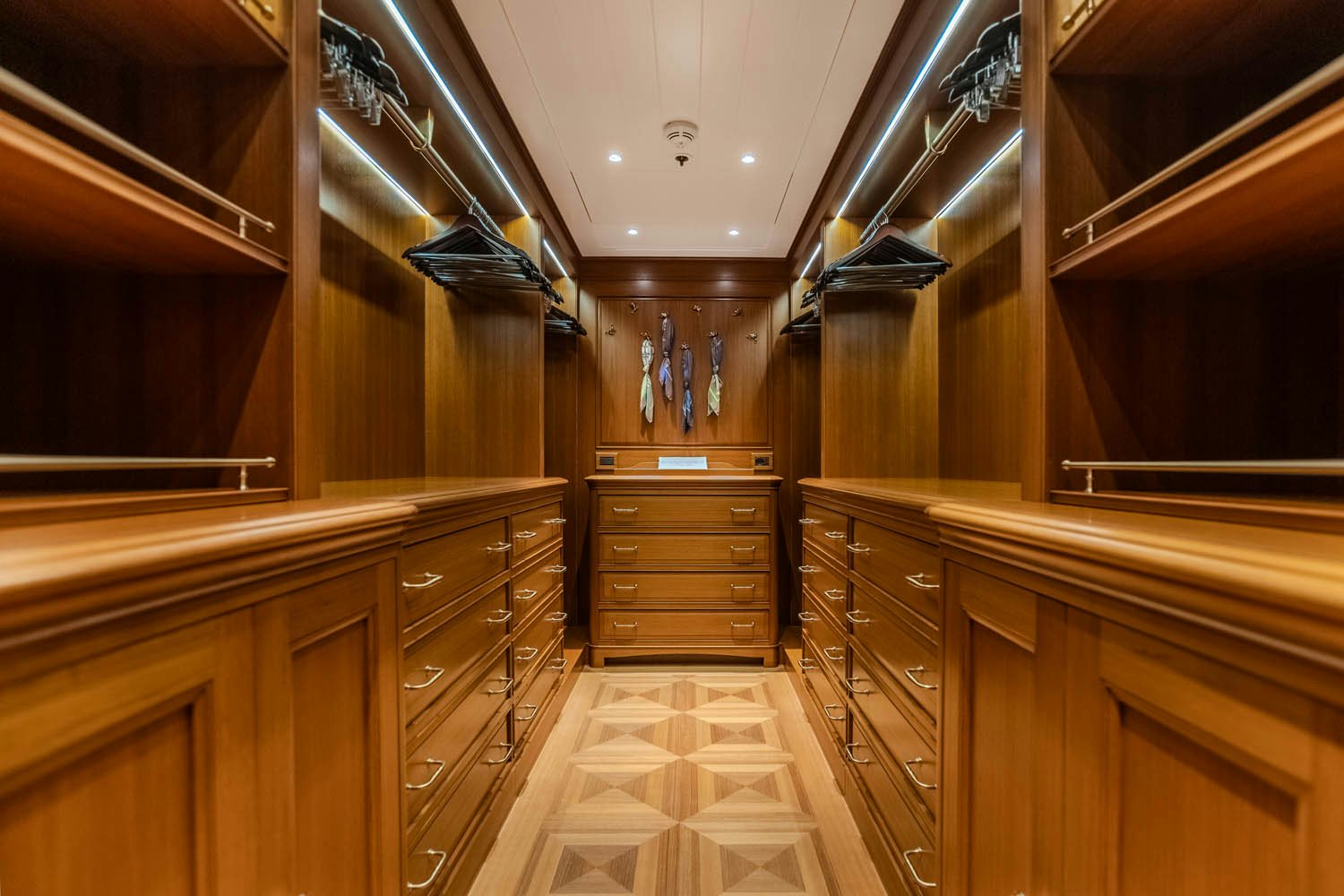 a kitchen with wooden cabinets aboard SEA OWL Yacht for Charter