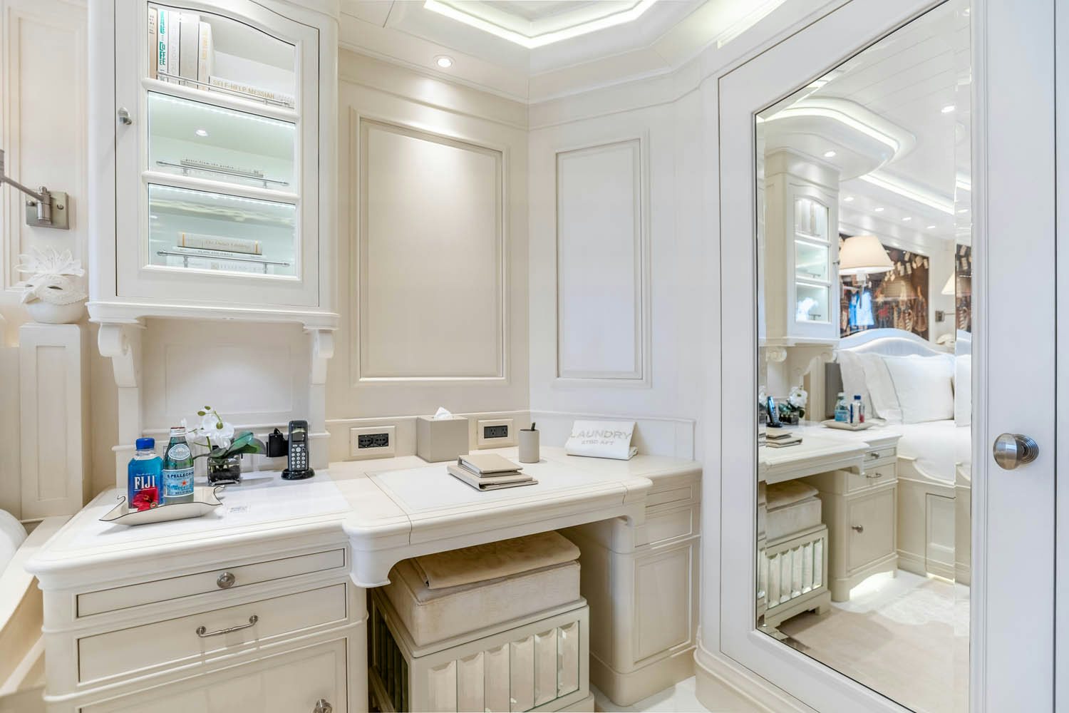 a kitchen with white cabinets aboard SEA OWL Yacht for Charter
