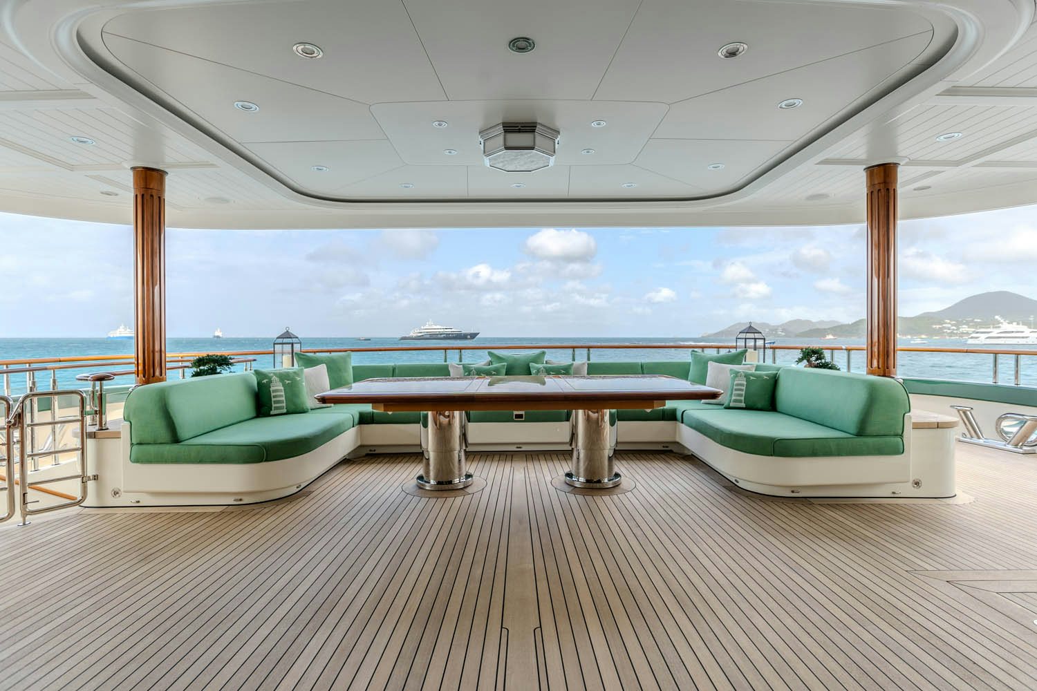 a room with a table and chairs aboard SEA OWL Yacht for Charter