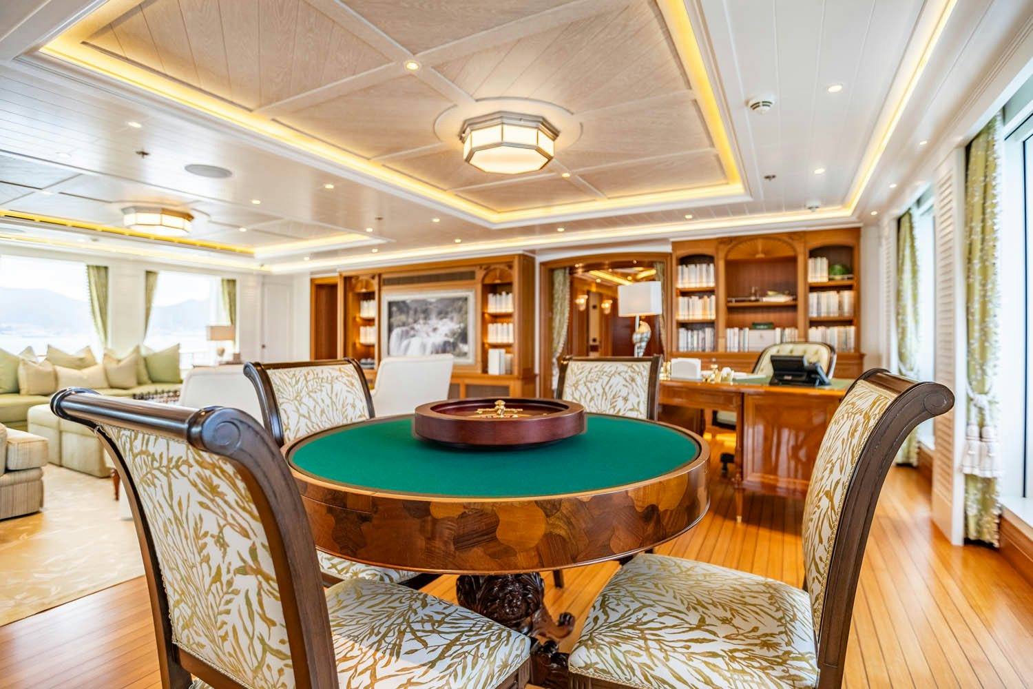 a living room with a table and chairs aboard SEA OWL Yacht for Charter
