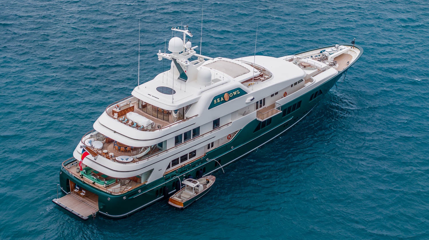 a large ship in the water aboard SEA OWL Yacht for Charter