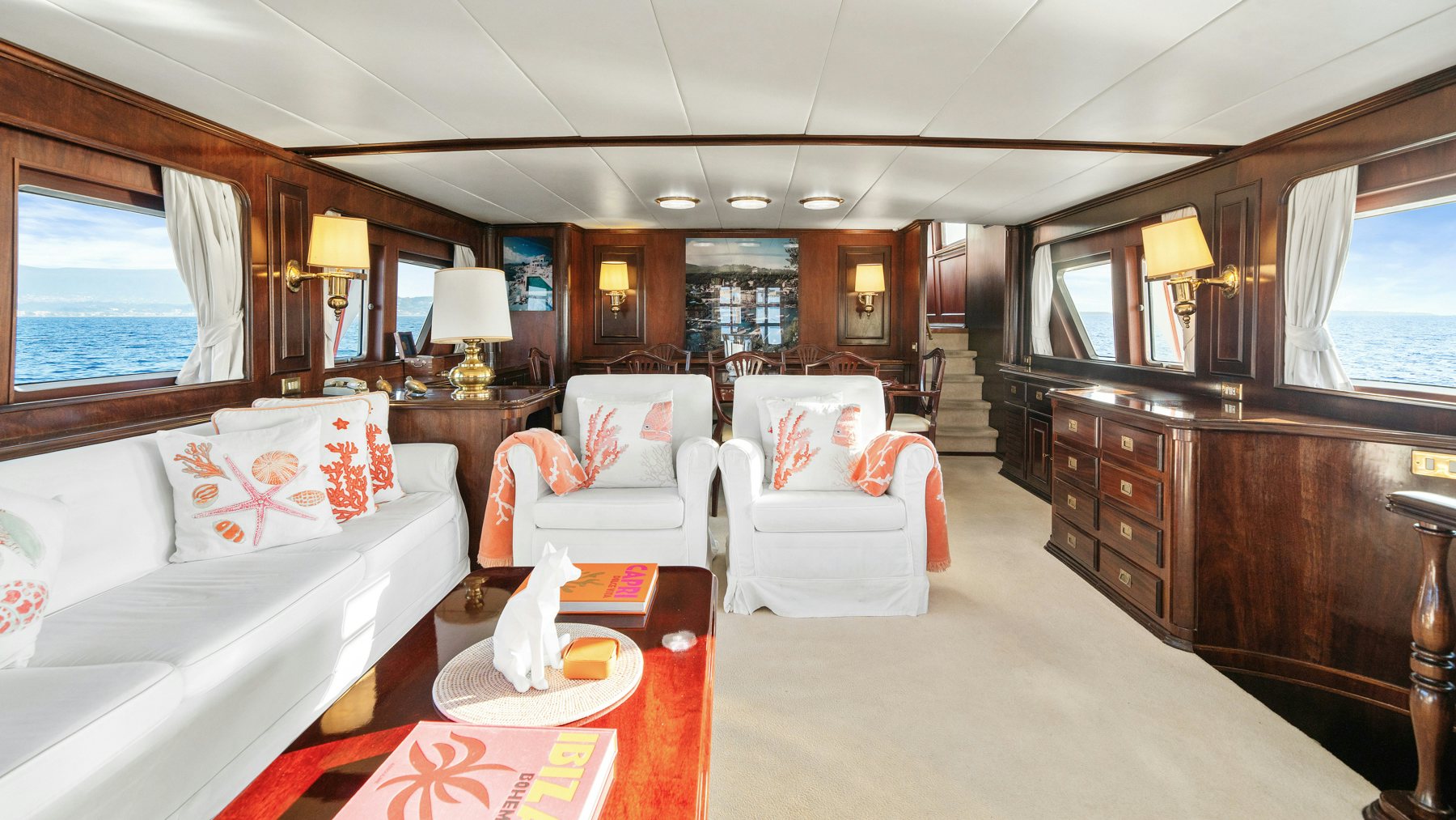 a living room with a large window aboard AMMIRAGLIO Yacht for Sale