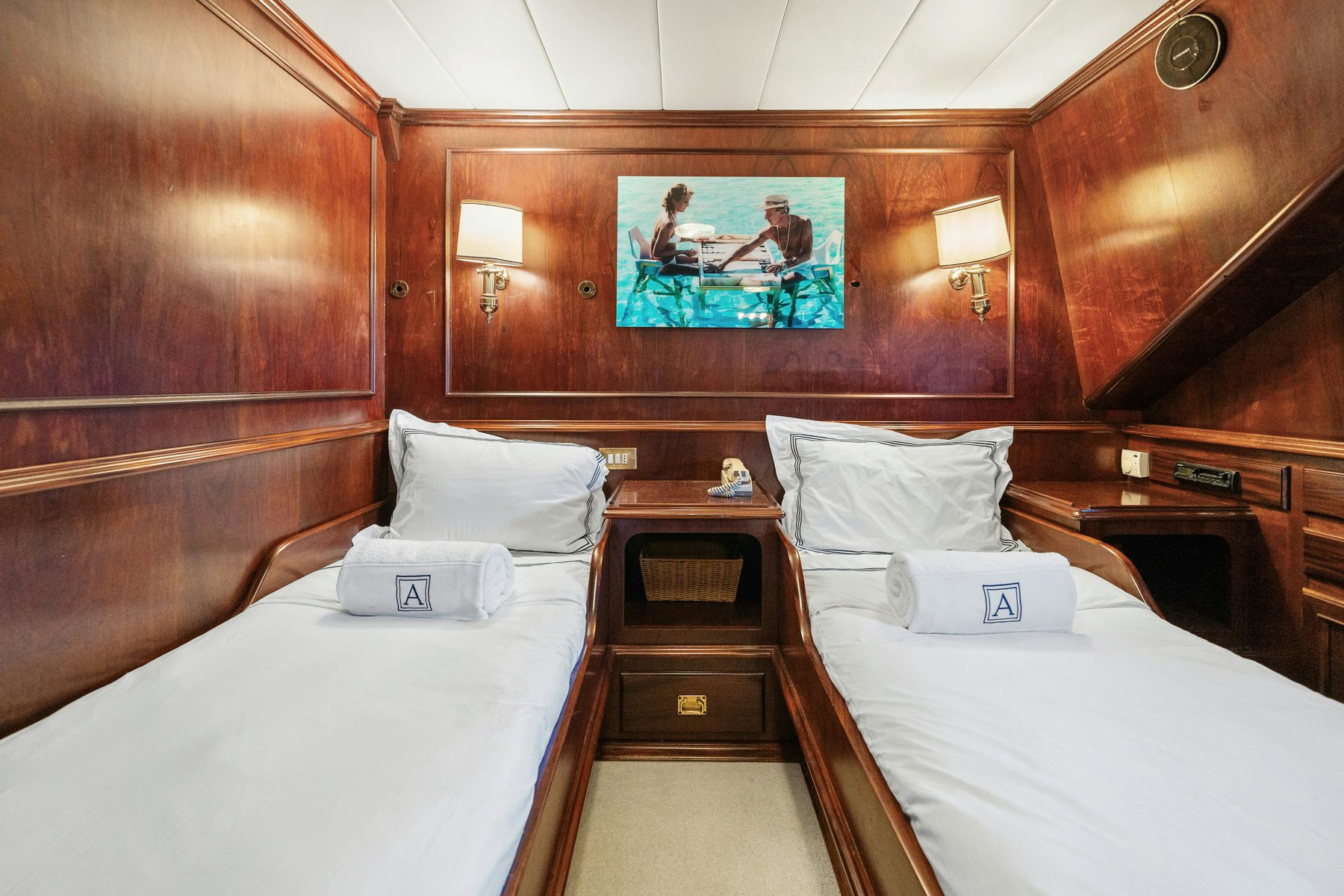 a couple of beds in a hotel room aboard AMMIRAGLIO Yacht for Sale
