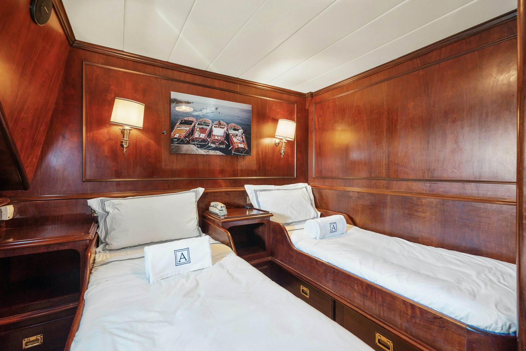 a couple of beds in a hotel room aboard AMMIRAGLIO Yacht for Sale