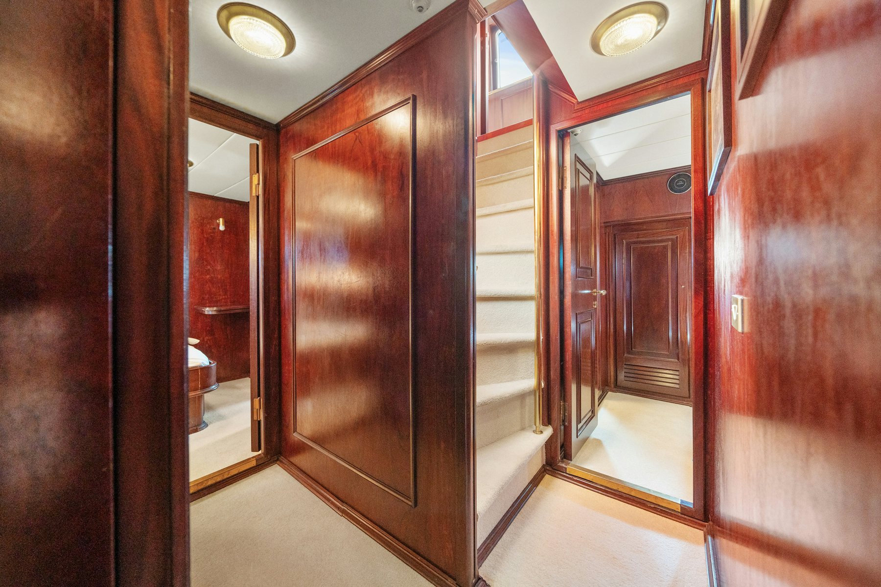 a room with wooden cabinets aboard AMMIRAGLIO Yacht for Sale