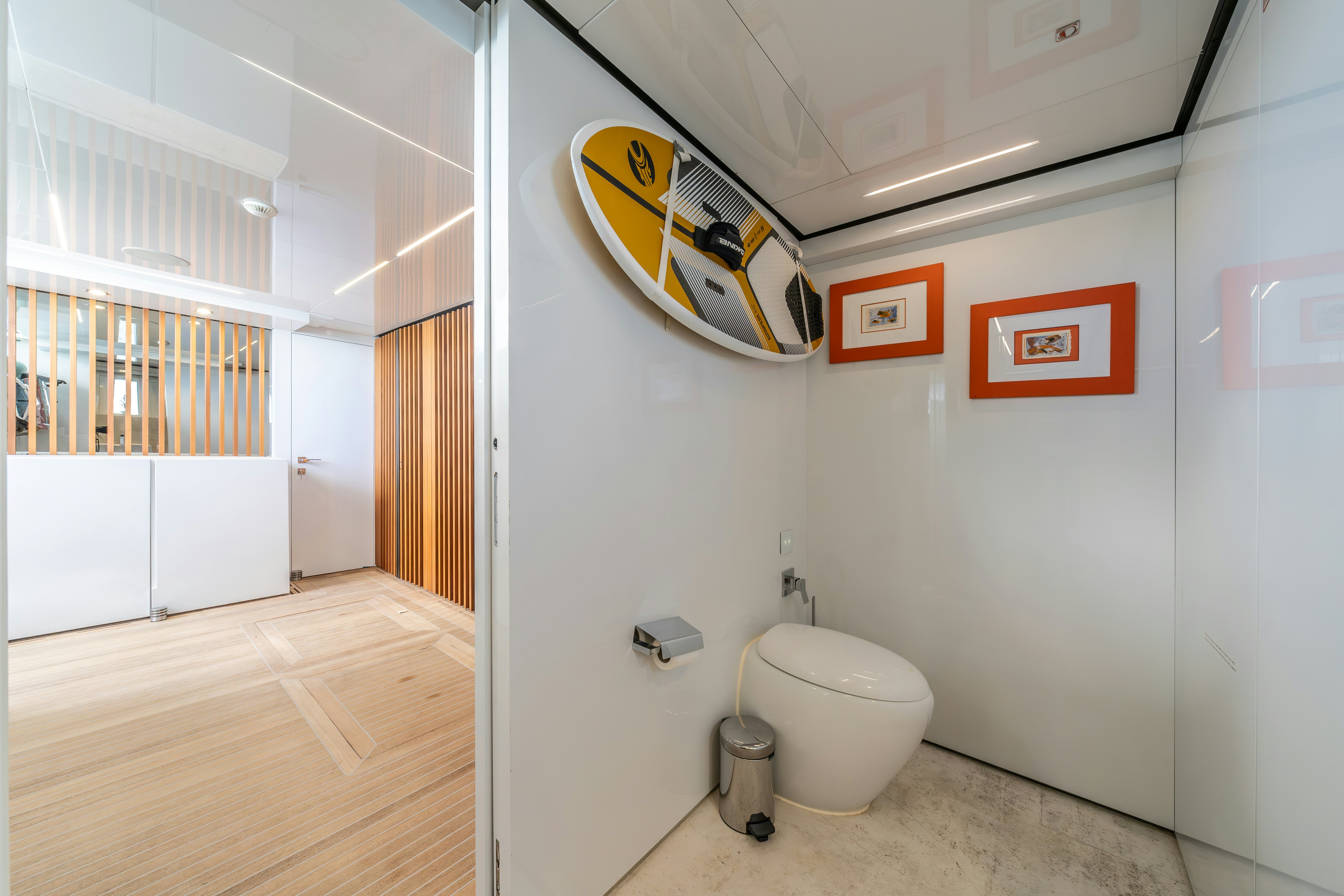 a bathroom with a toilet and a sink aboard EMOCEAN Yacht for Sale