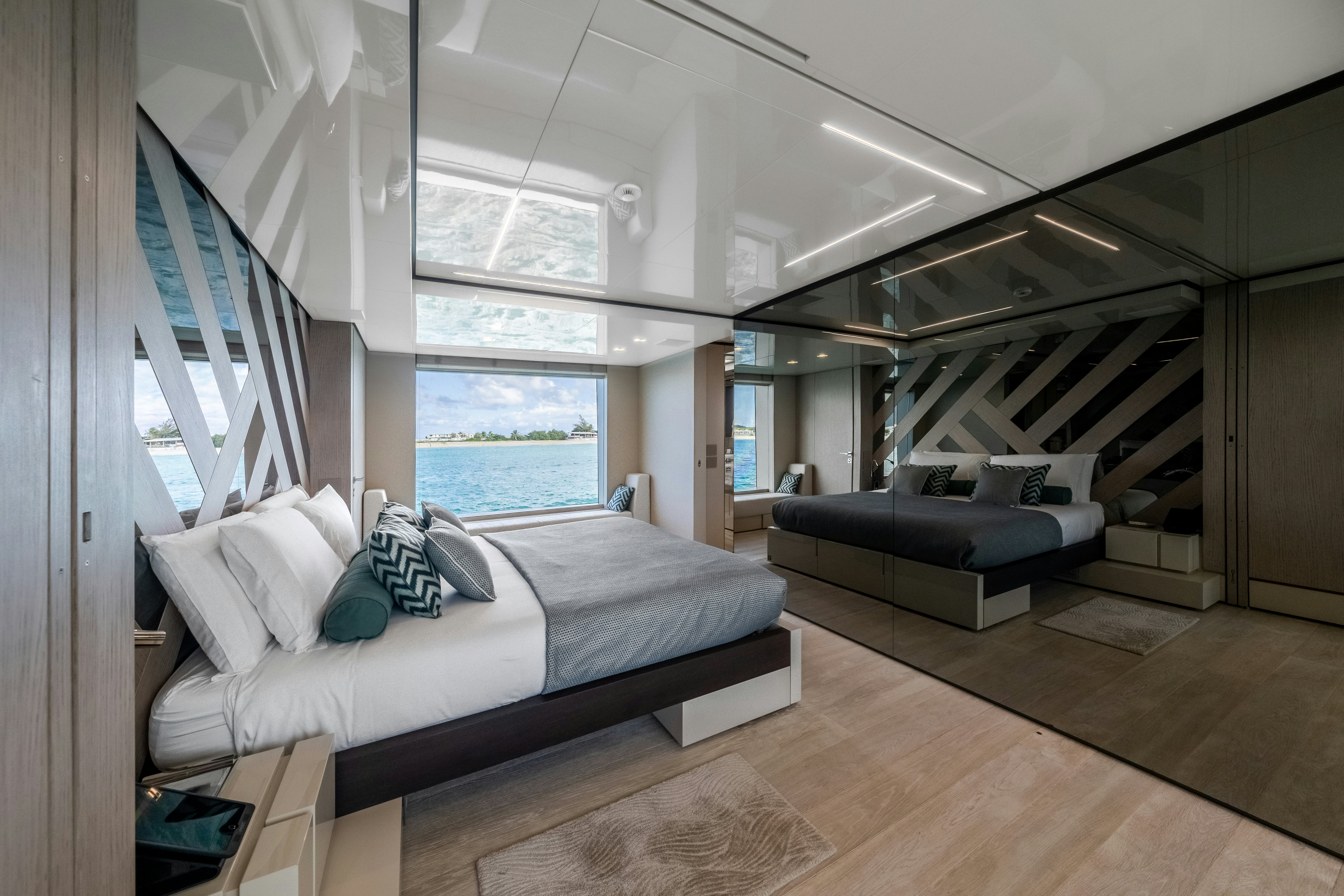 a bedroom with a large bed aboard EMOCEAN Yacht for Sale