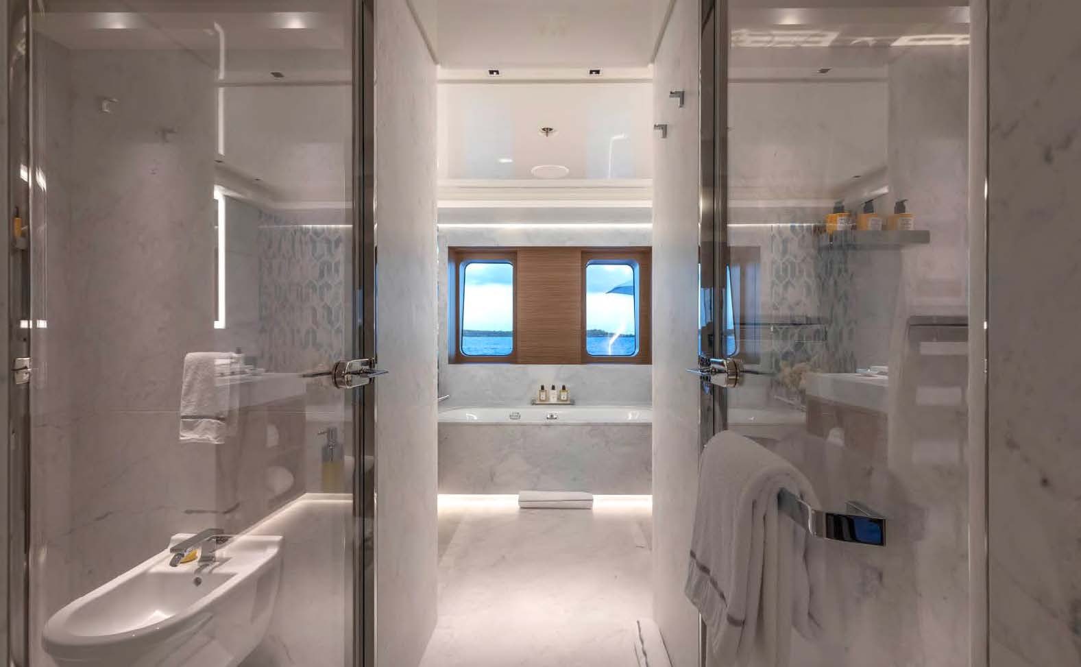 a bathroom with a sink and a mirror aboard MOONSTONE Yacht for Sale