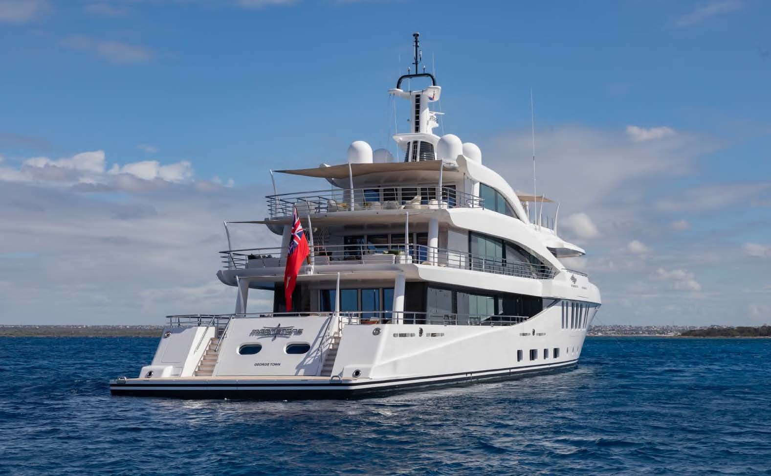 a large white boat in the water aboard MOONSTONE Yacht for Sale