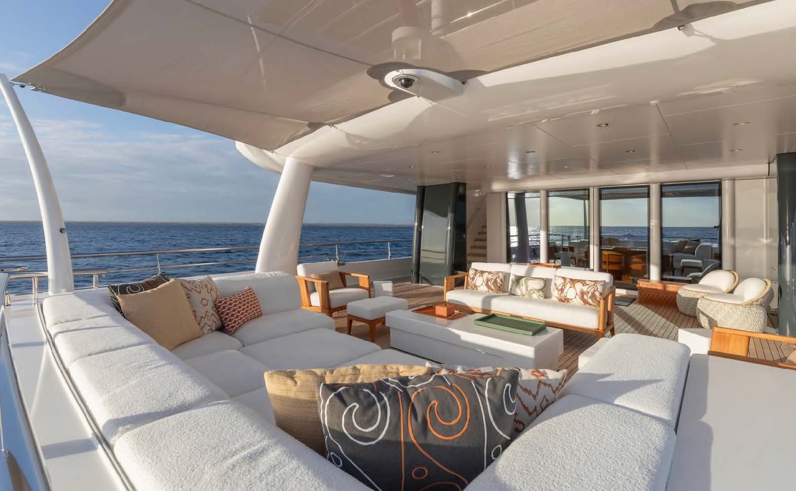 a living room with a large ocean aboard MOONSTONE Yacht for Sale