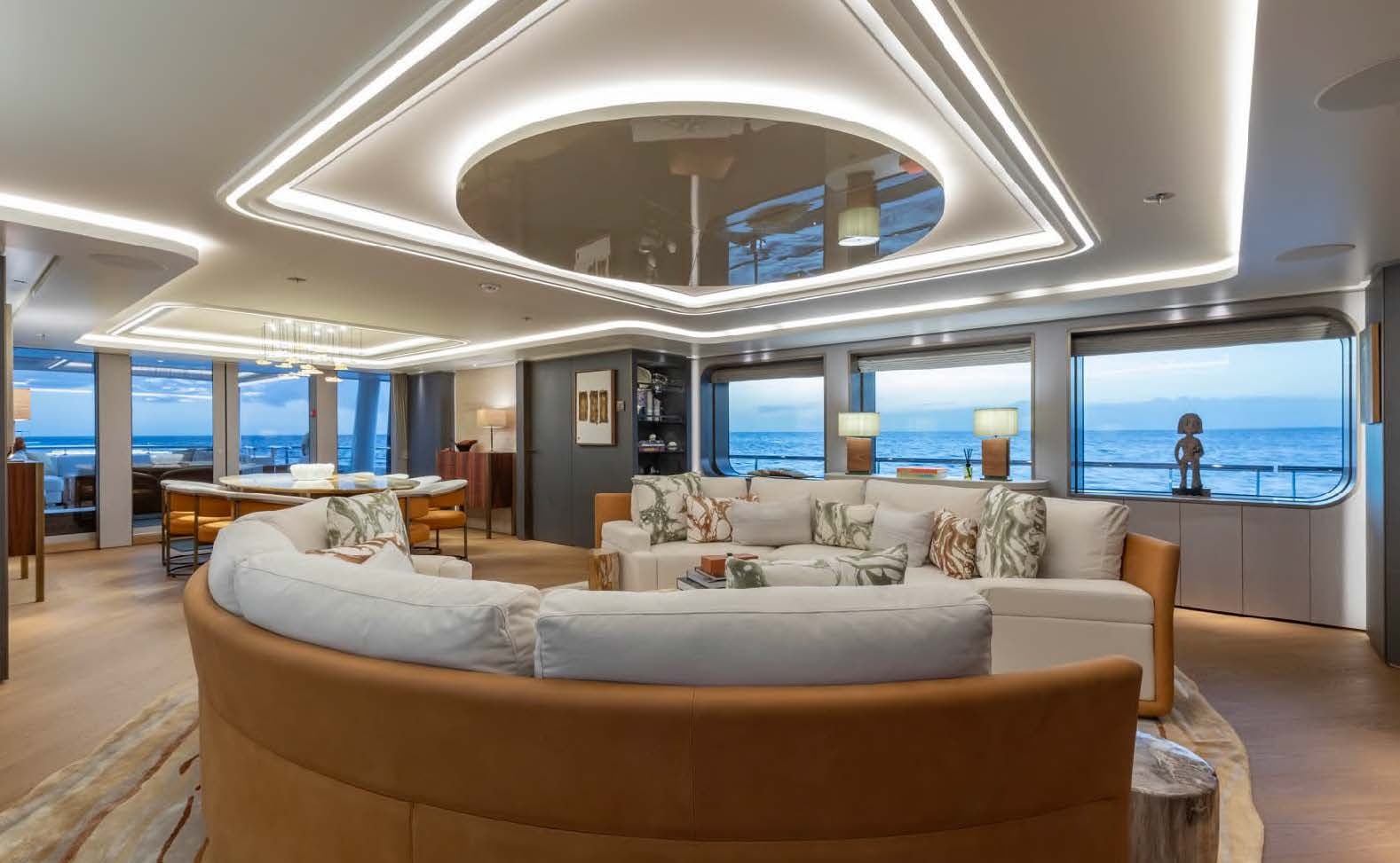 a living room with a large window aboard MOONSTONE Yacht for Sale