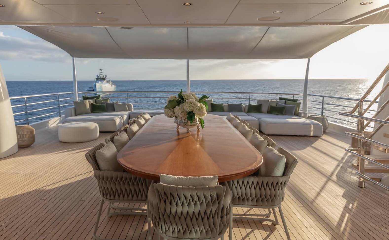 a room with a table and chairs aboard MOONSTONE Yacht for Sale
