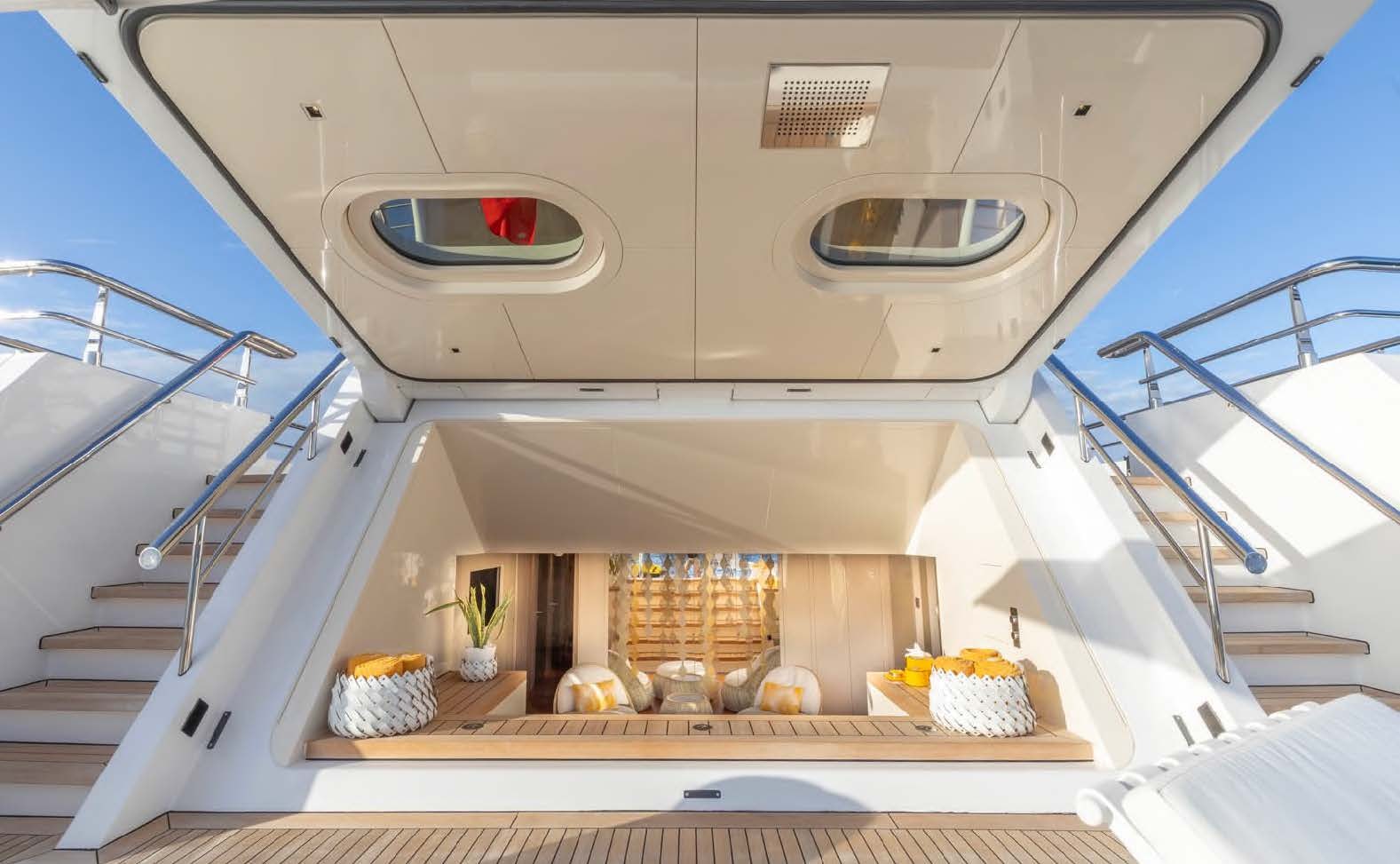 a white building with a large window aboard MOONSTONE Yacht for Sale