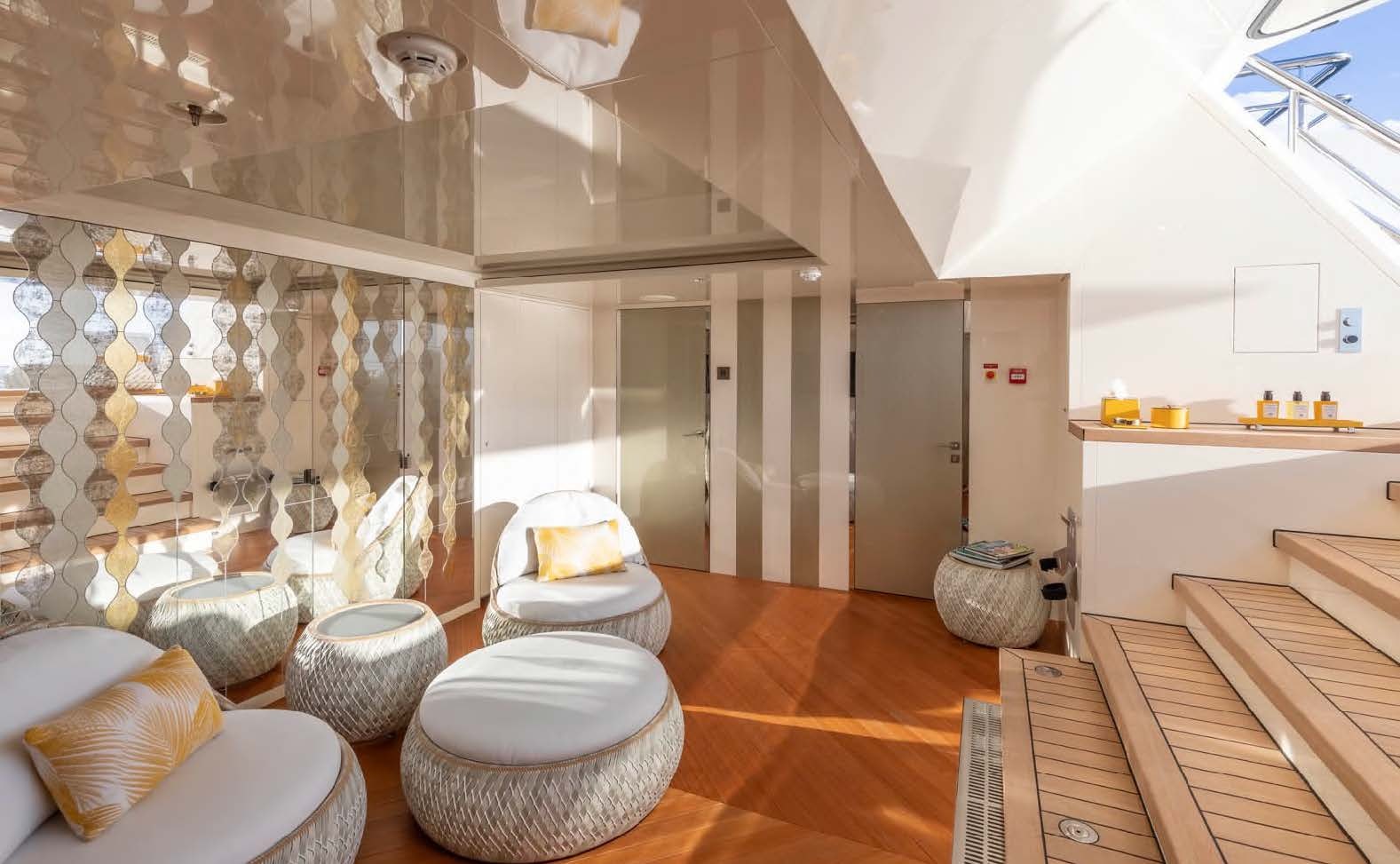 a room with a large display of vases and bowls aboard MOONSTONE Yacht for Sale