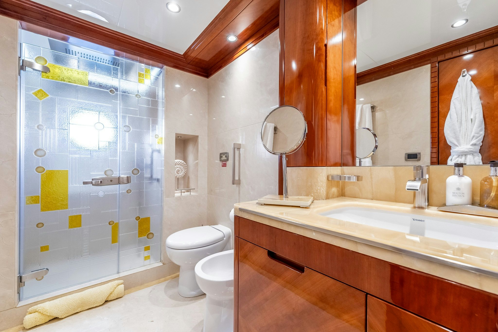 a bathroom with a glass shower aboard GRAND CRU Yacht for Sale