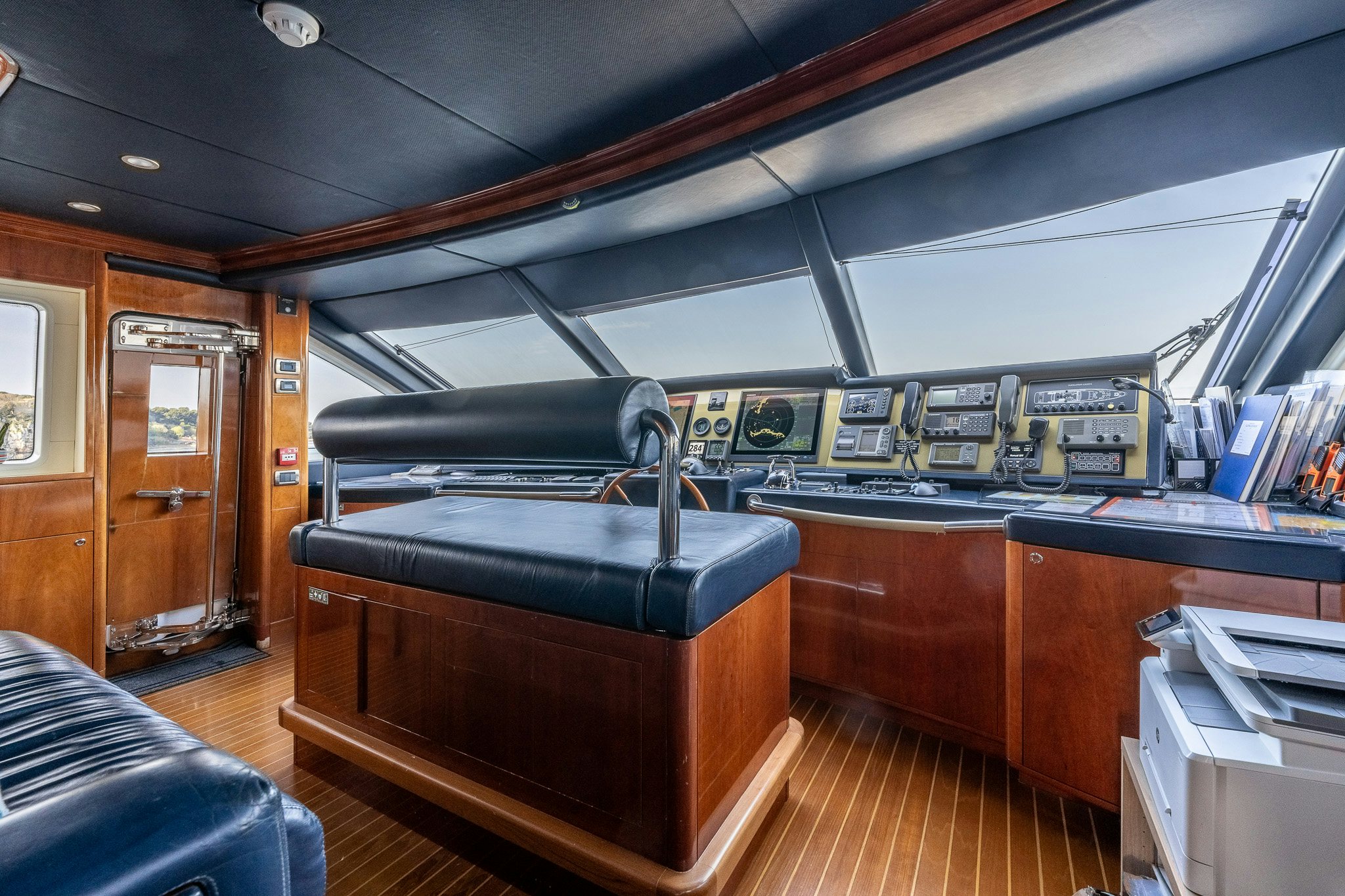 a room with a desk and a chair aboard GRAND CRU Yacht for Sale