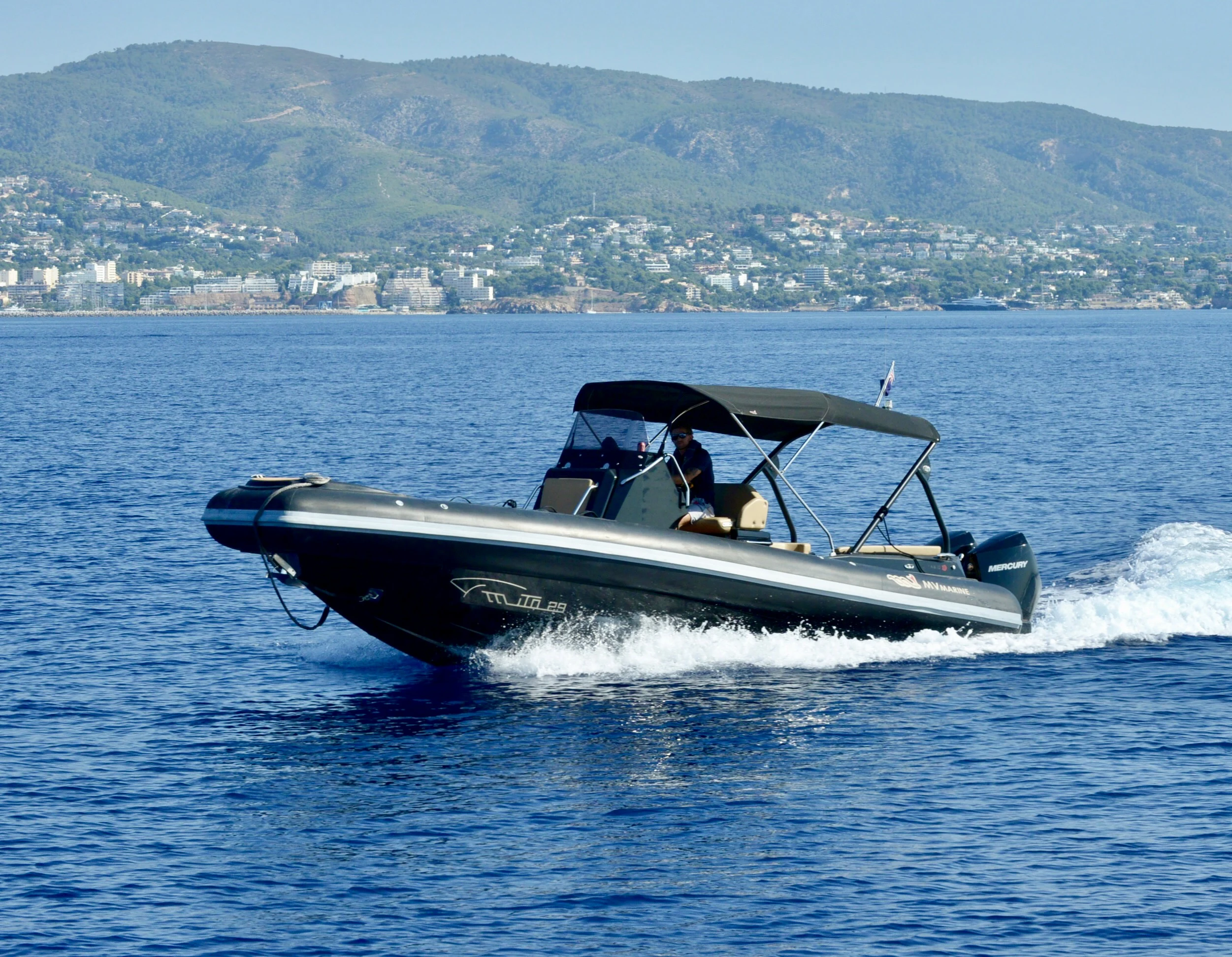 a boat with people in it aboard GRAND CRU Yacht for Charter