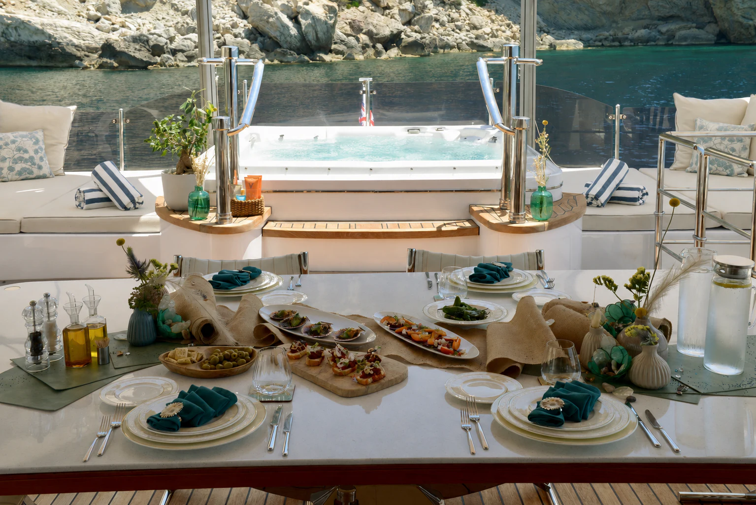 a table with food on it aboard GRAND CRU Yacht for Charter