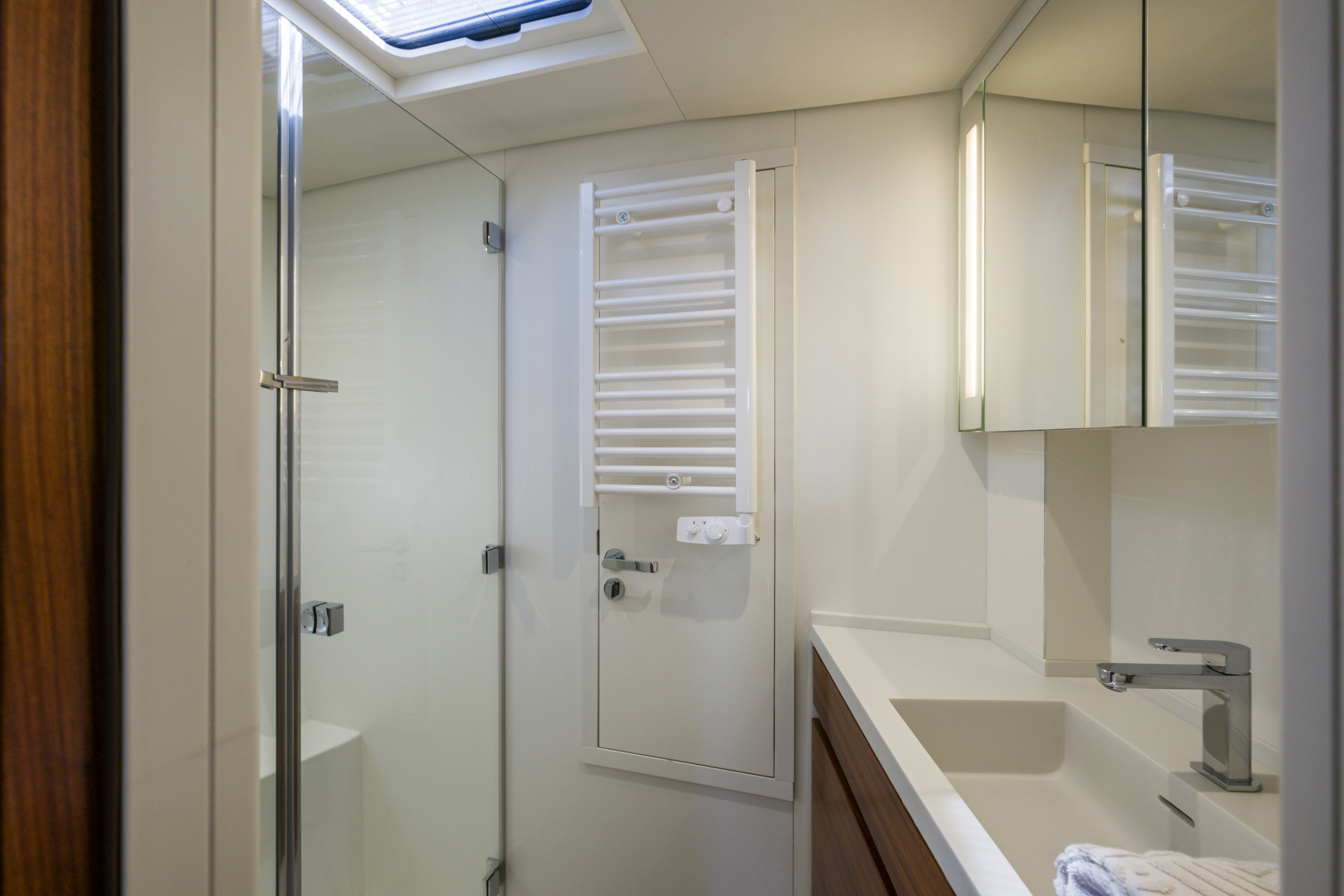 a bathroom with a shower unit aboard DREAM ON Yacht for Sale