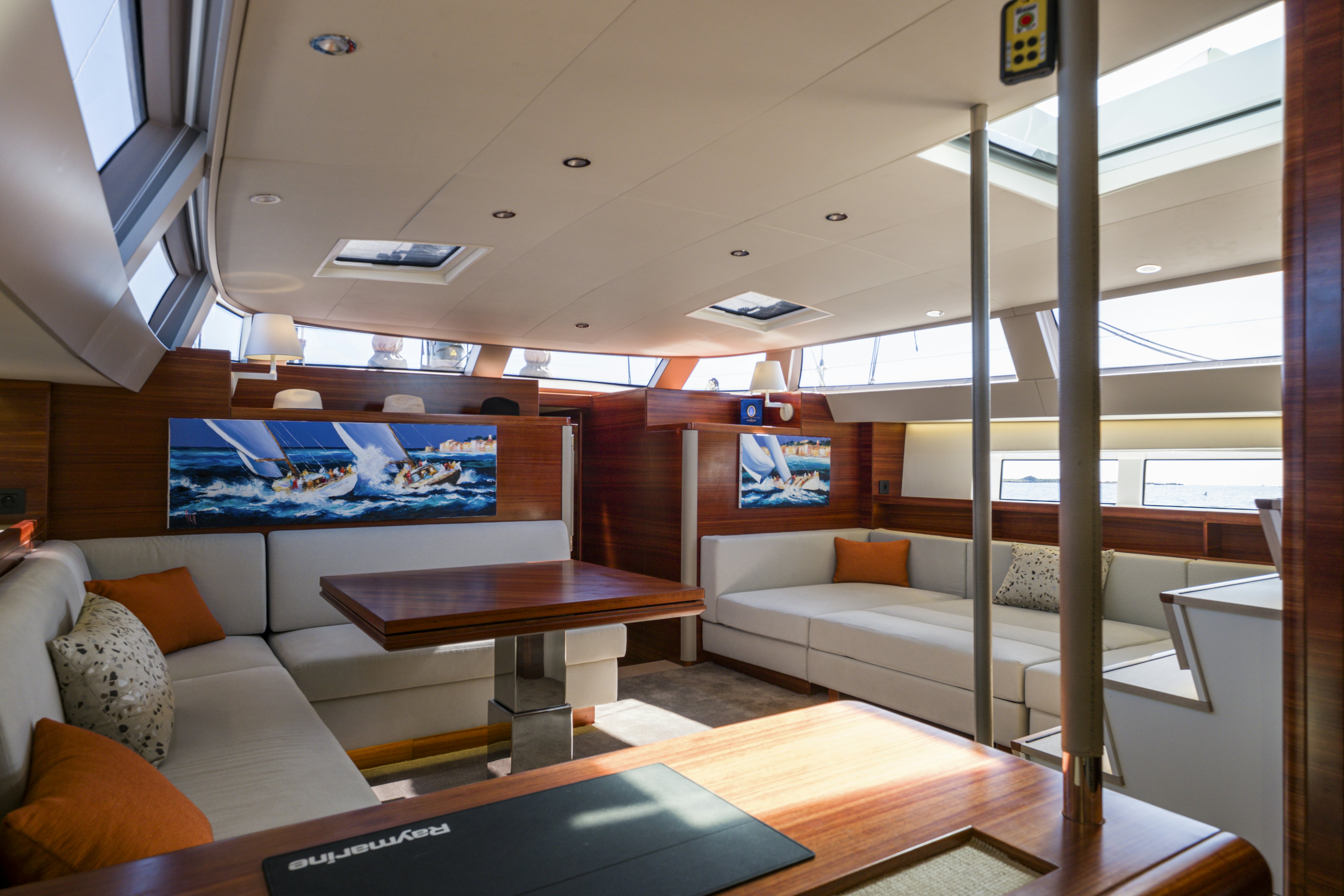 a room with a couch and a table aboard DREAM ON Yacht for Sale