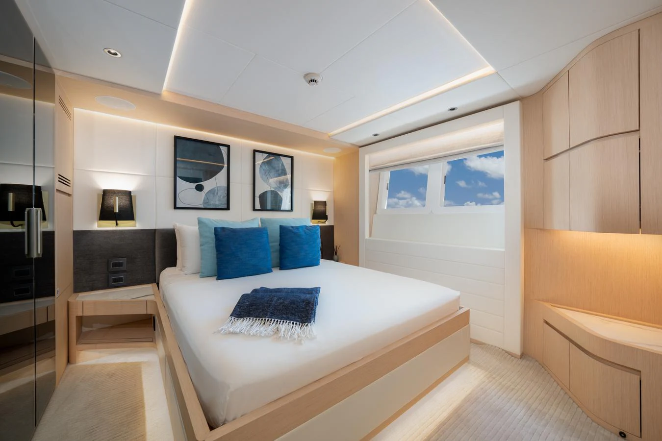 a room with a bed and a tv aboard GOLD STAR Yacht for Charter