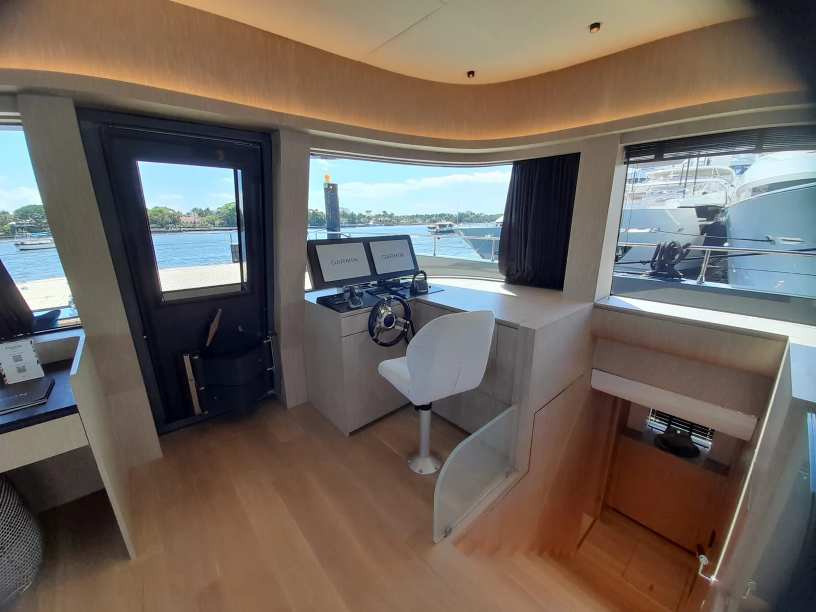 a room with a desk and a window aboard FLAGSHIP Yacht for Sale