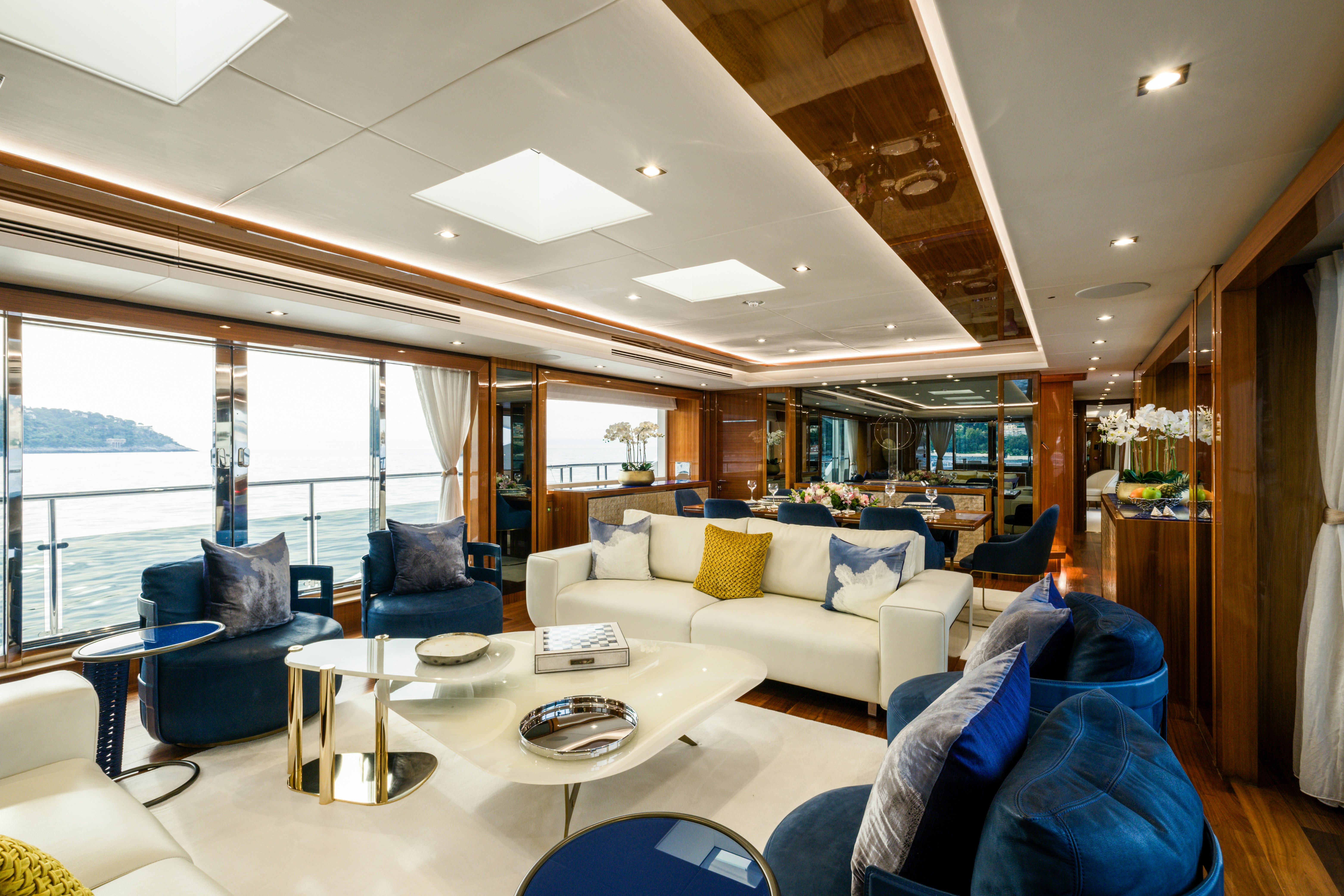 a living room with a large window aboard MERCY OCEANS Yacht for Sale