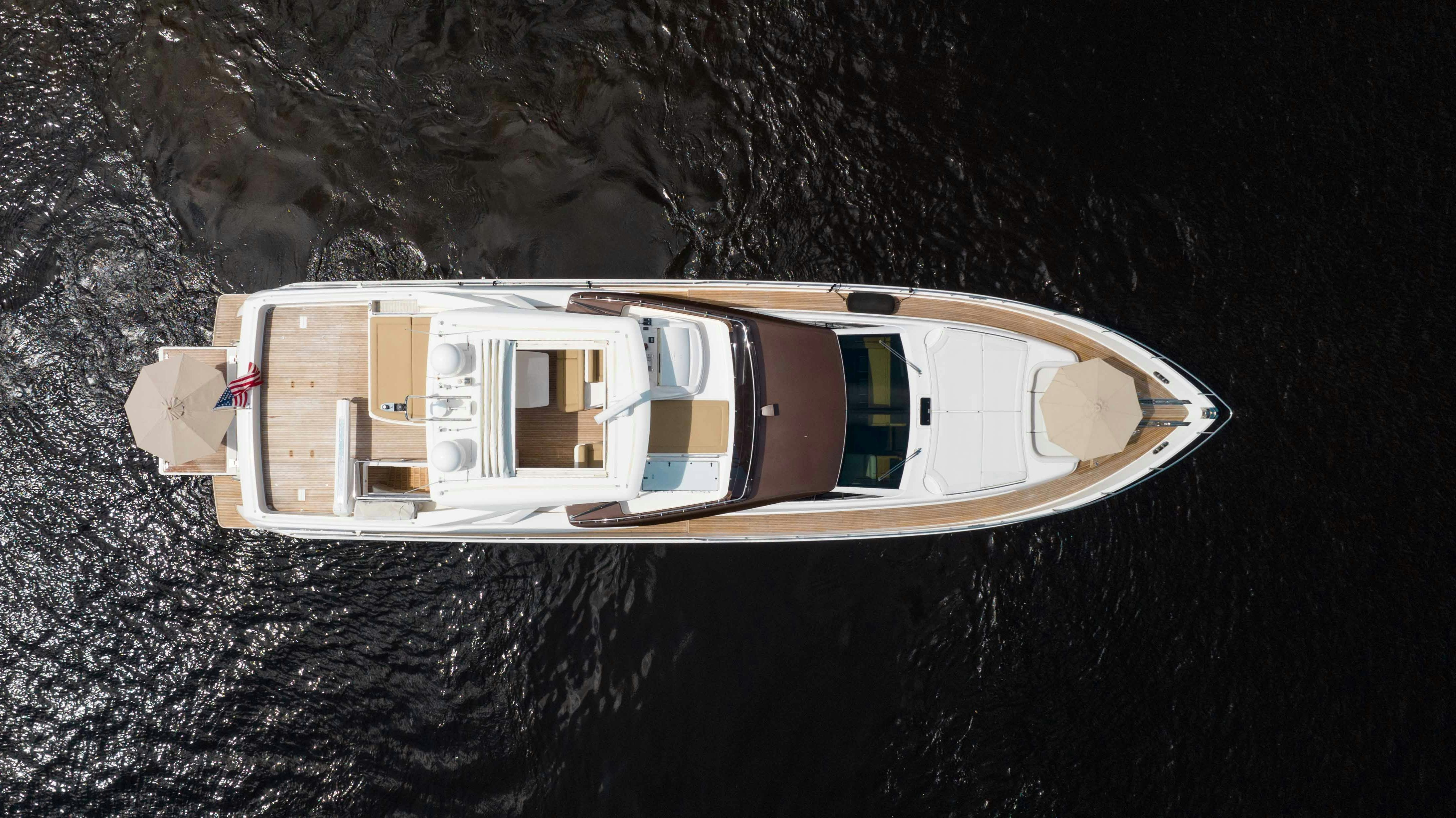 a white and brown boat on water aboard LIVING LIFE 3 Yacht for Sale