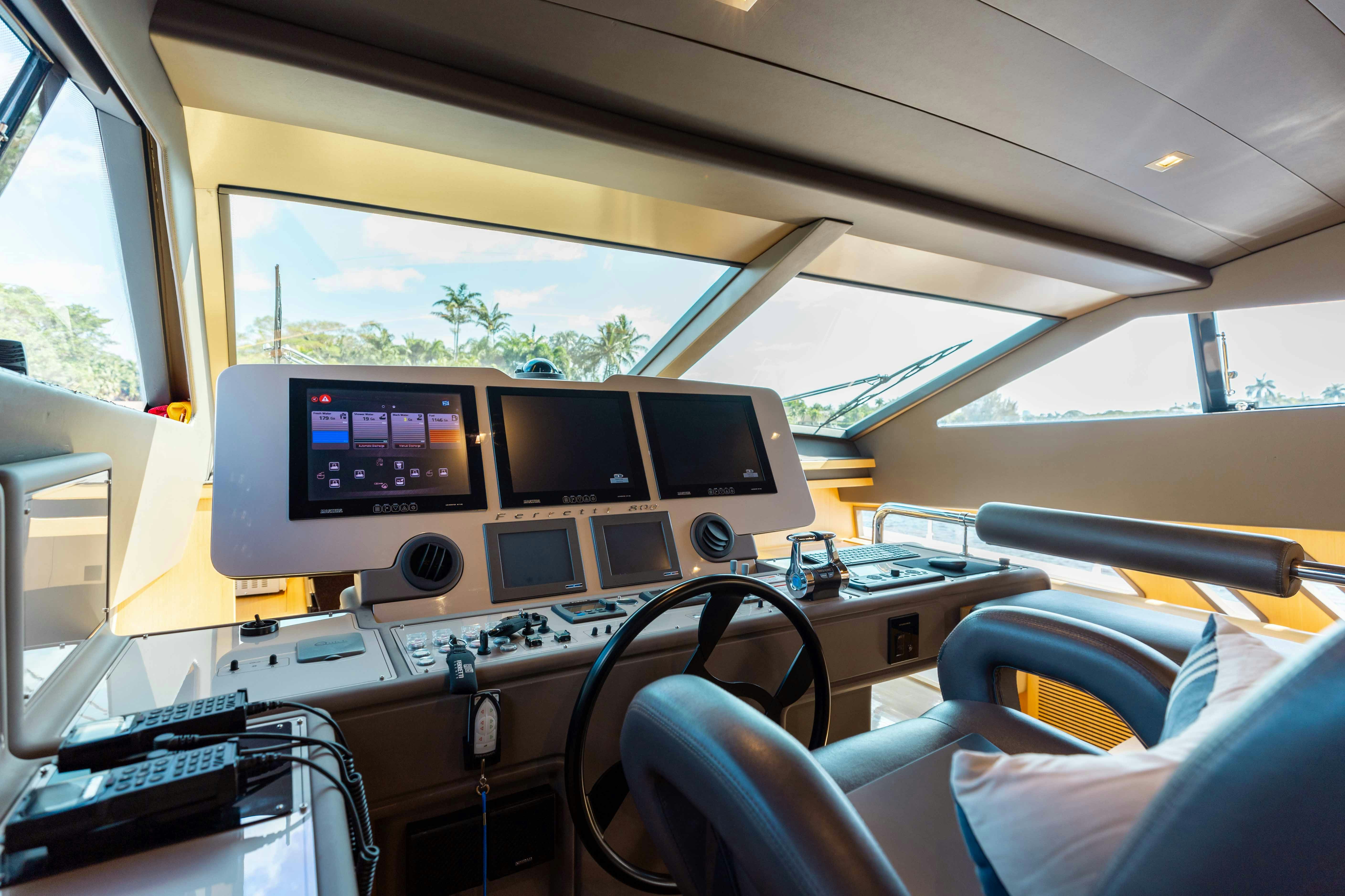 inside of a vehicle with monitors and speakers aboard LIVING LIFE 3 Yacht for Sale