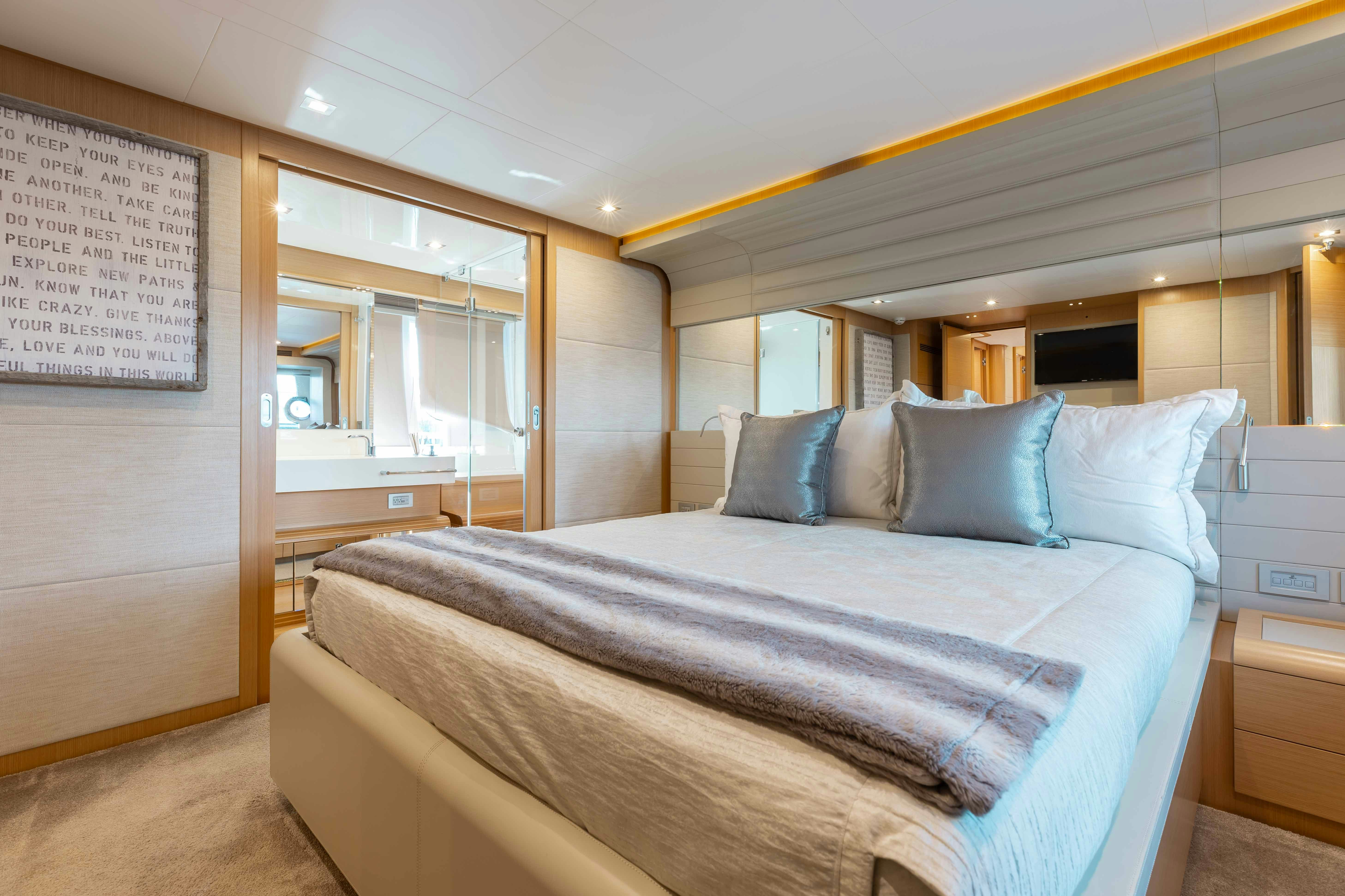a bed in a room aboard LIVING LIFE 3 Yacht for Sale