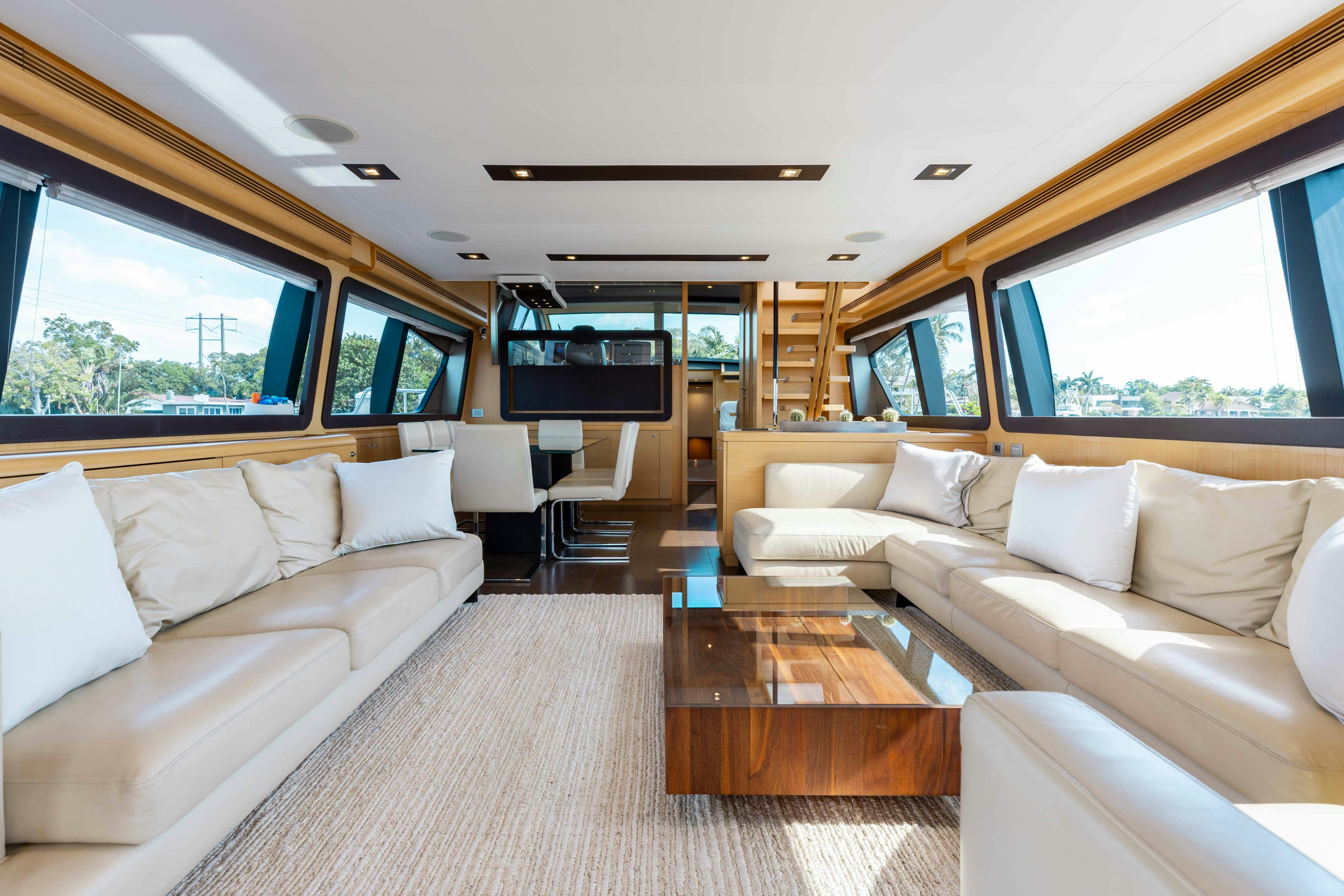 a living room with a couch and a tv aboard LIVING LIFE 3 Yacht for Sale