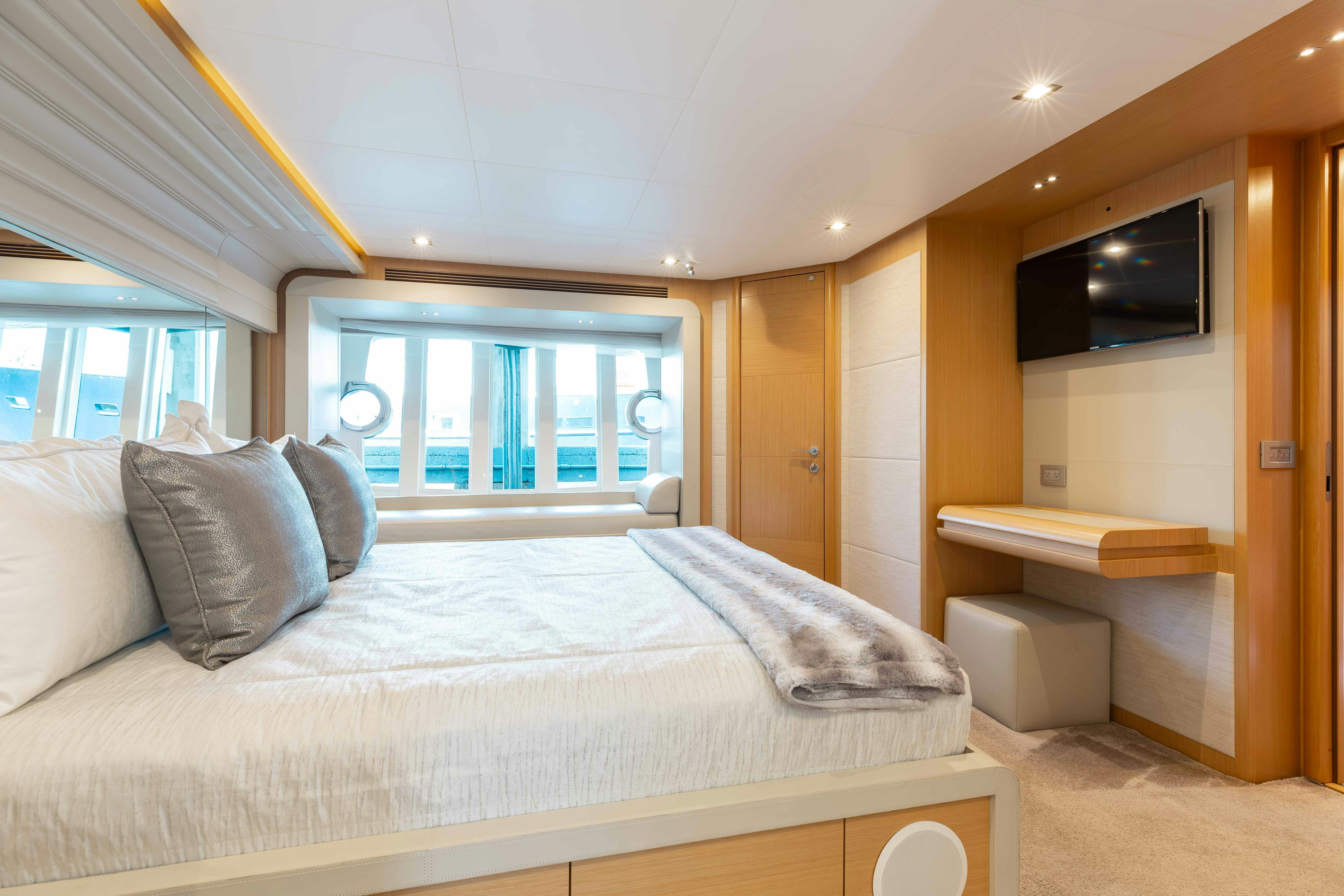 a bed in a room aboard LIVING LIFE 3 Yacht for Sale