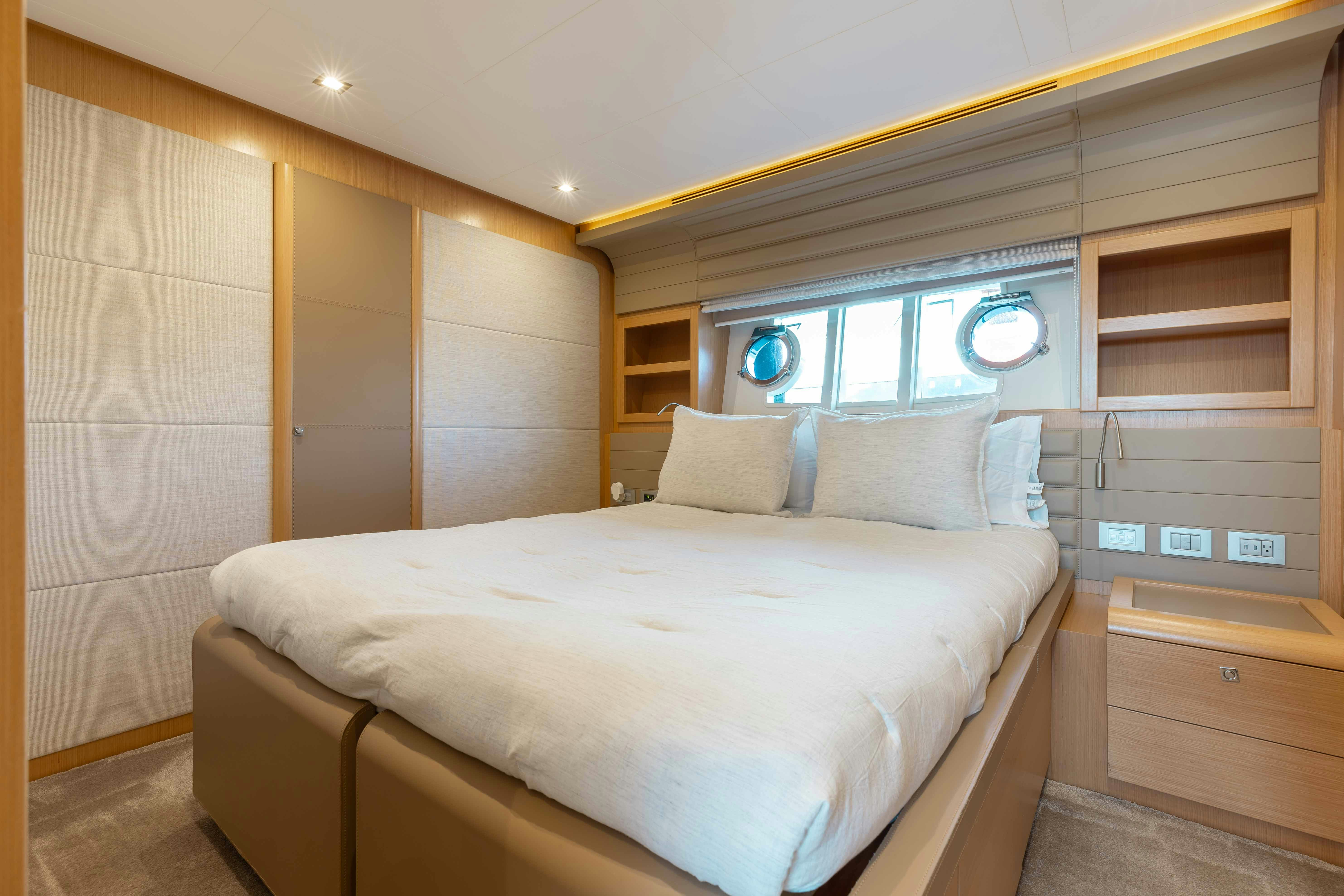 a bed in a room aboard LIVING LIFE 3 Yacht for Sale