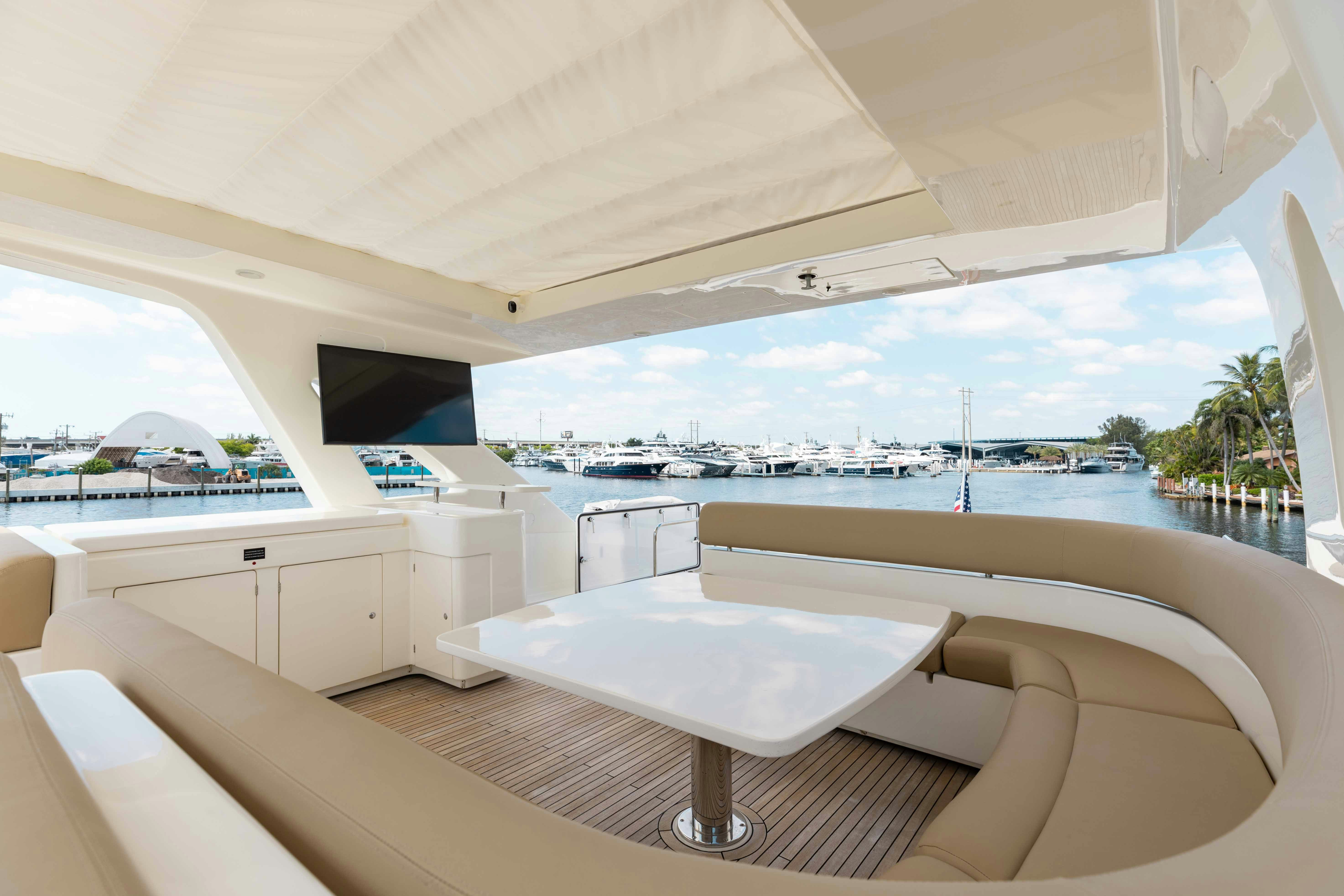 a room with a large window and a view of the water aboard LIVING LIFE 3 Yacht for Sale