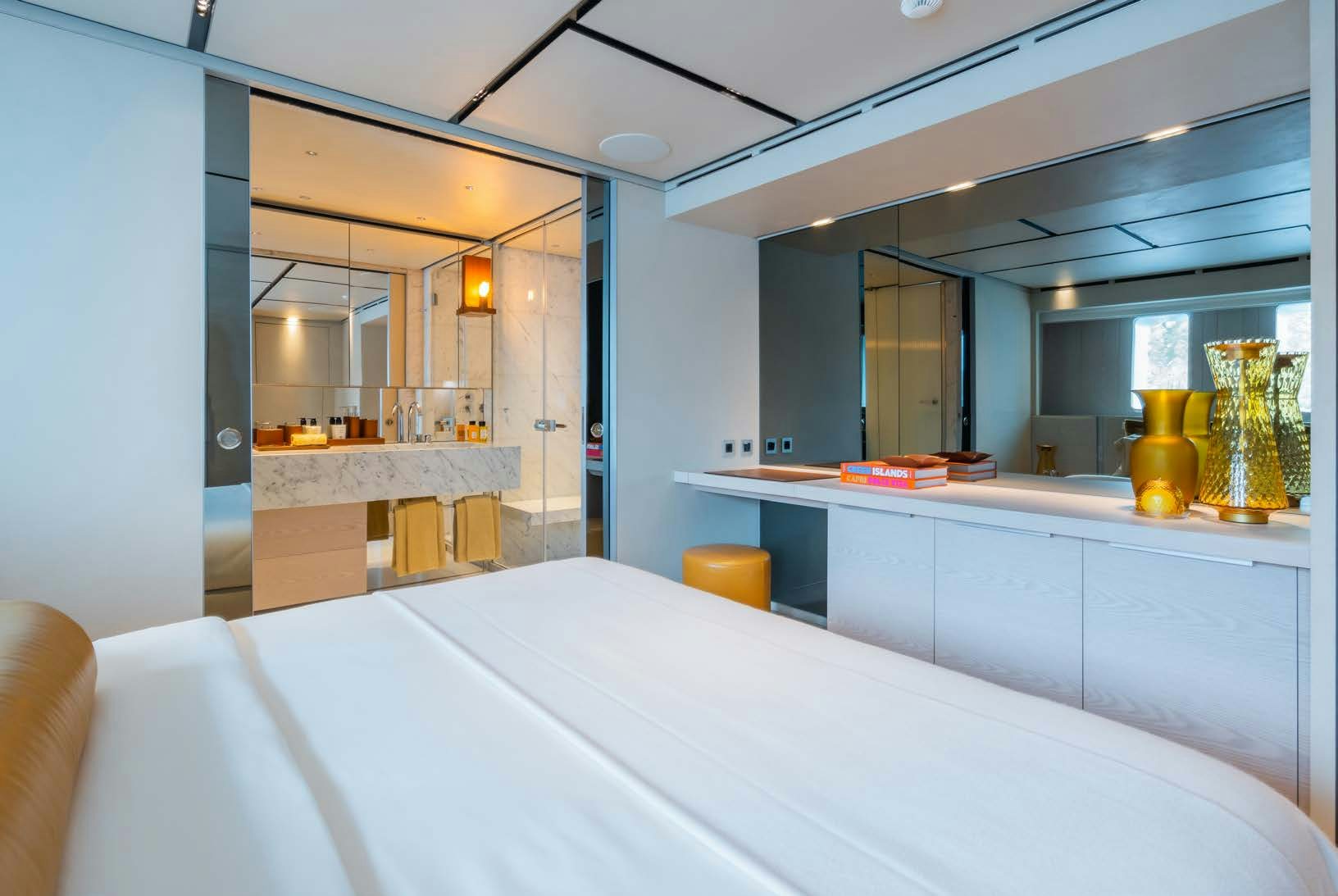 a room with a table and chairs aboard R.M.F Yacht for Charter