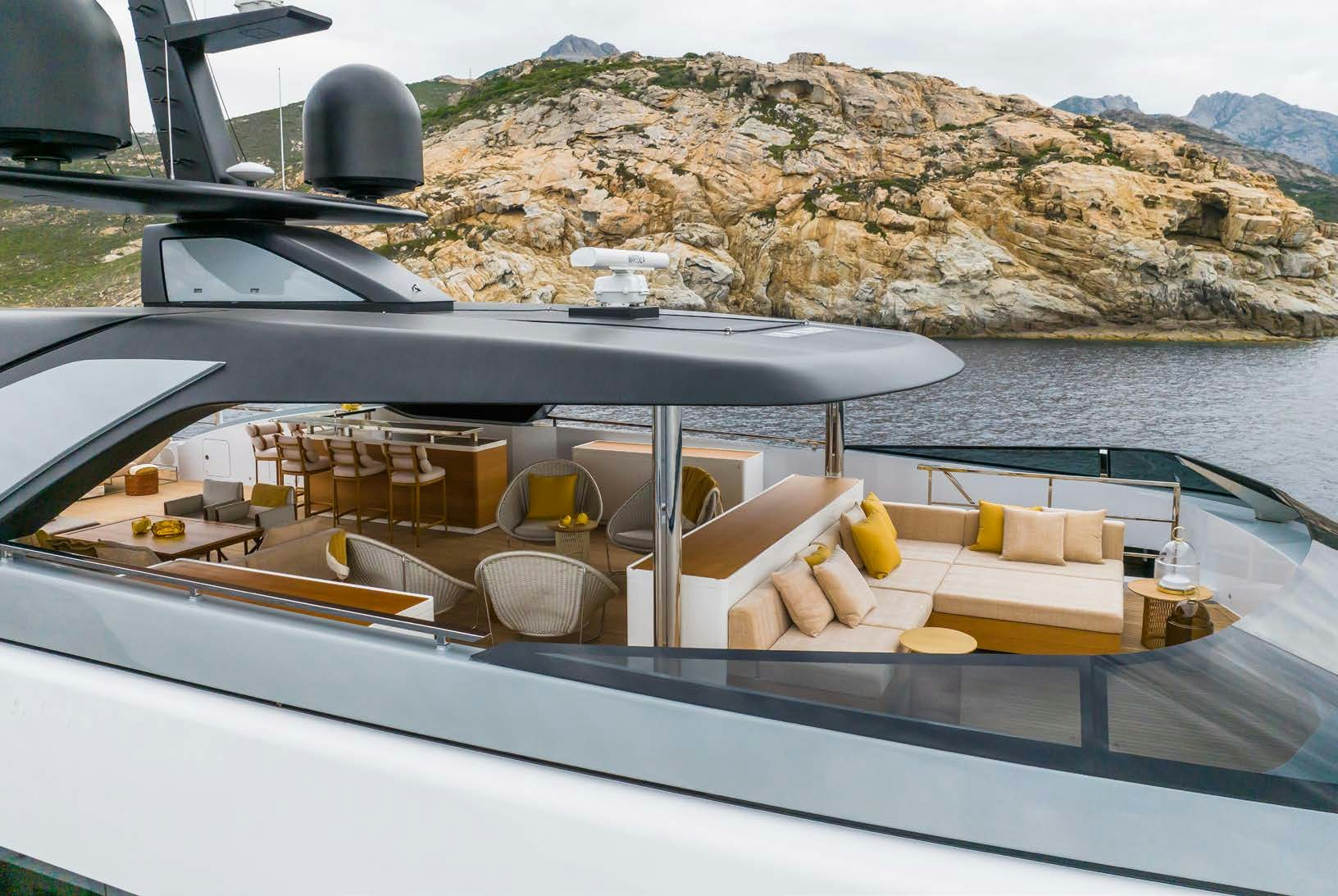 a boat with a bar on the deck aboard R.M.F Yacht for Charter