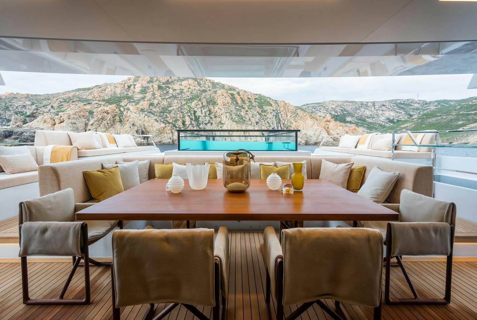 a table with glasses on it aboard R.M.F Yacht for Charter