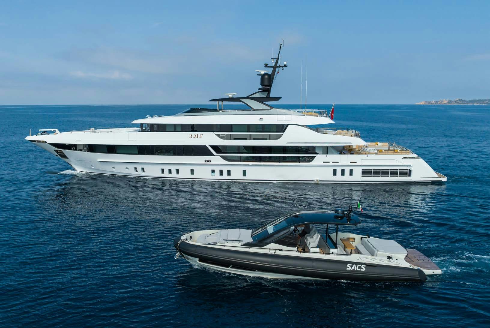 a white yacht in the water aboard R.M.F Yacht for Charter