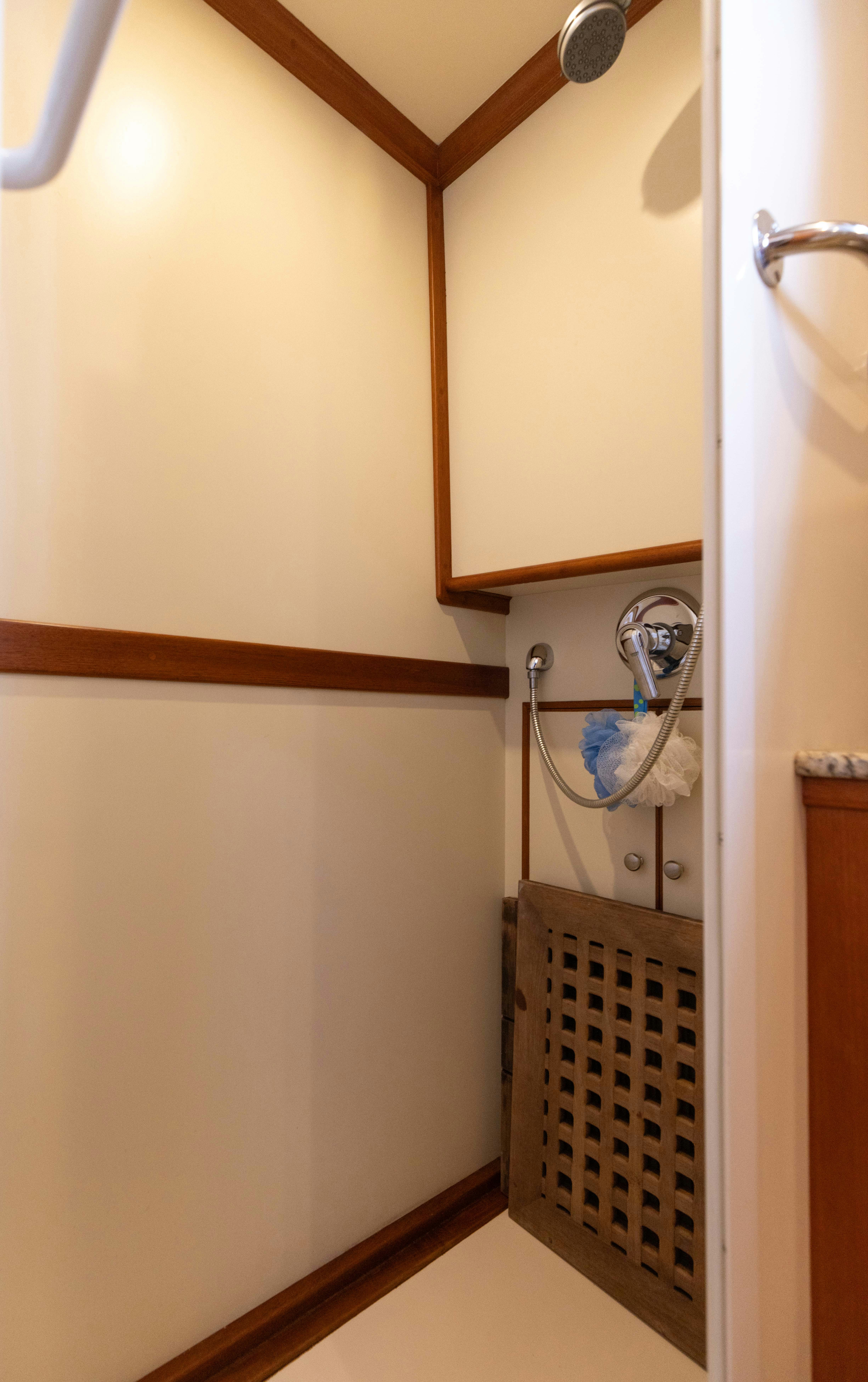 a bathroom with a mirror aboard INDABA Yacht for Sale