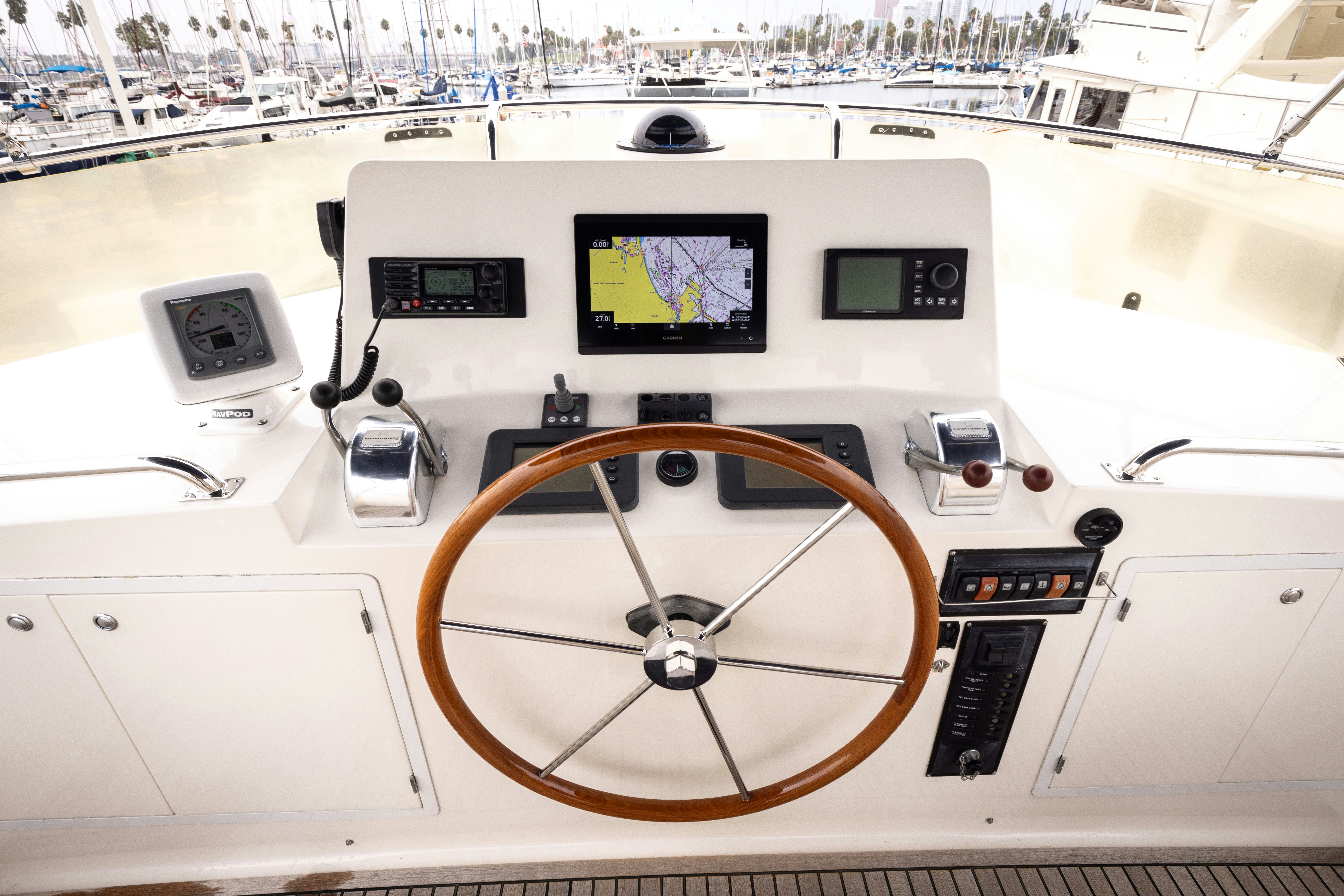 a white and orange cockpit aboard INDABA Yacht for Sale