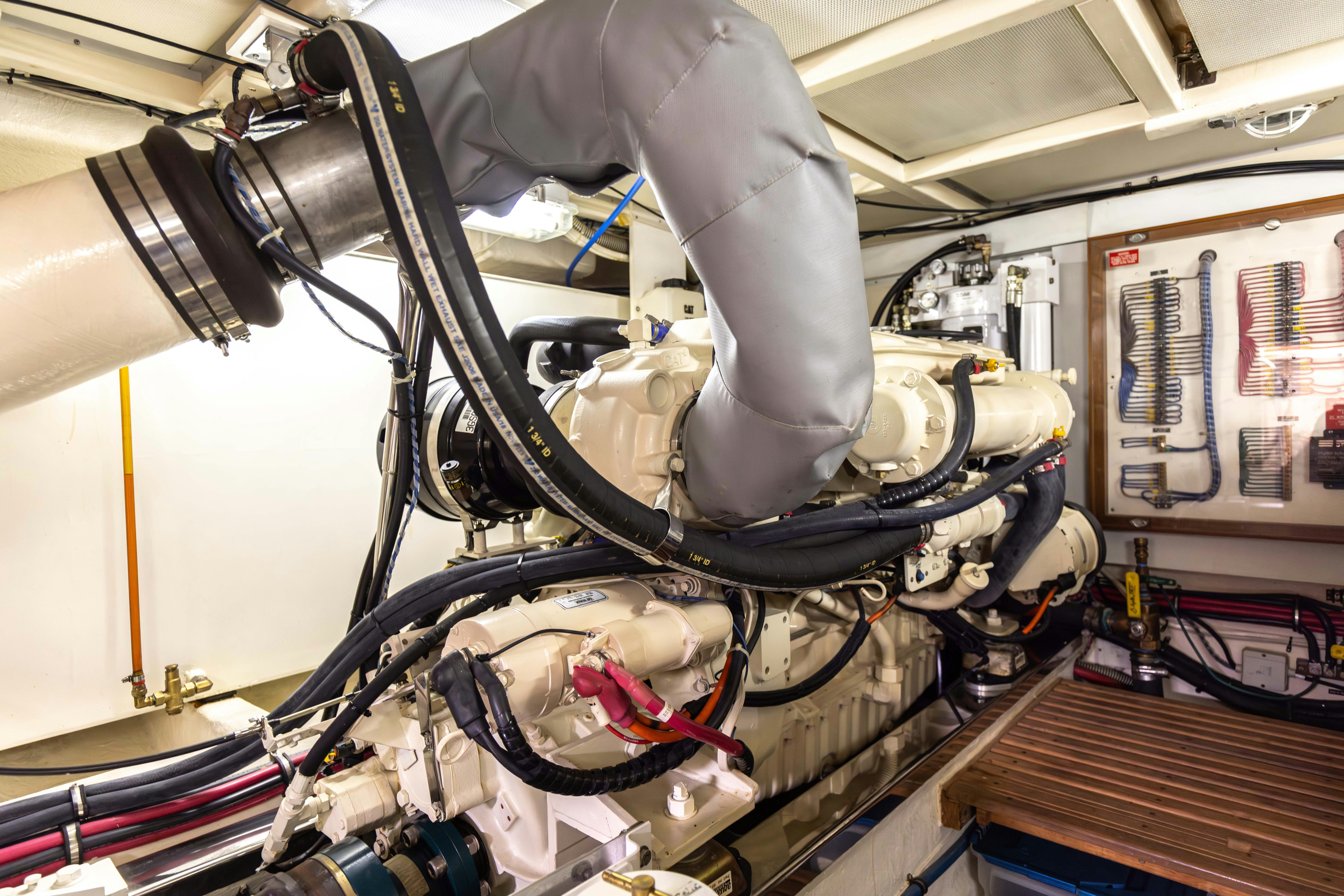 a person working on a car aboard INDABA Yacht for Sale