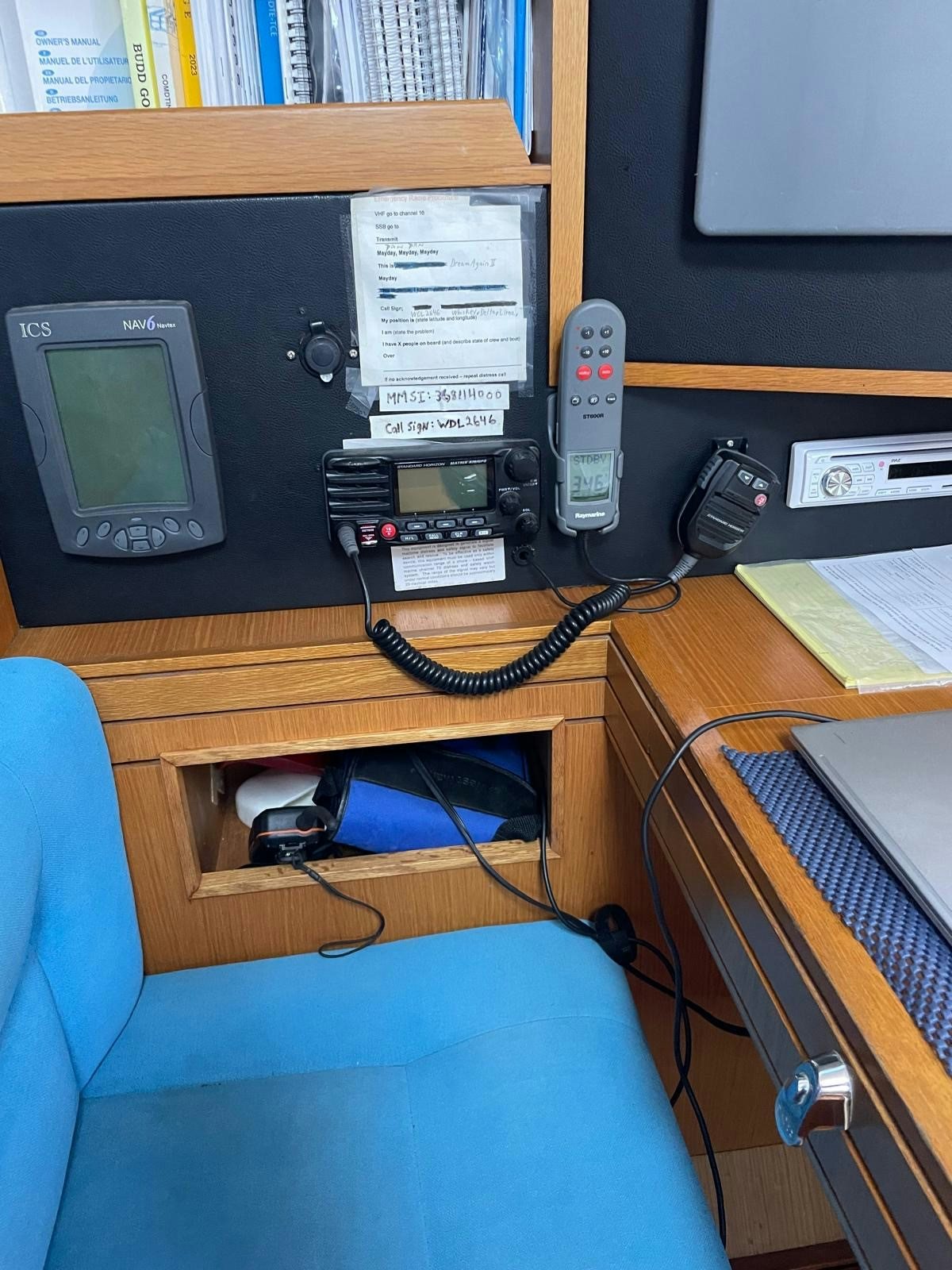 a desk with a telephone and a book shelf aboard DREAM AGAIN II Yacht for Sale