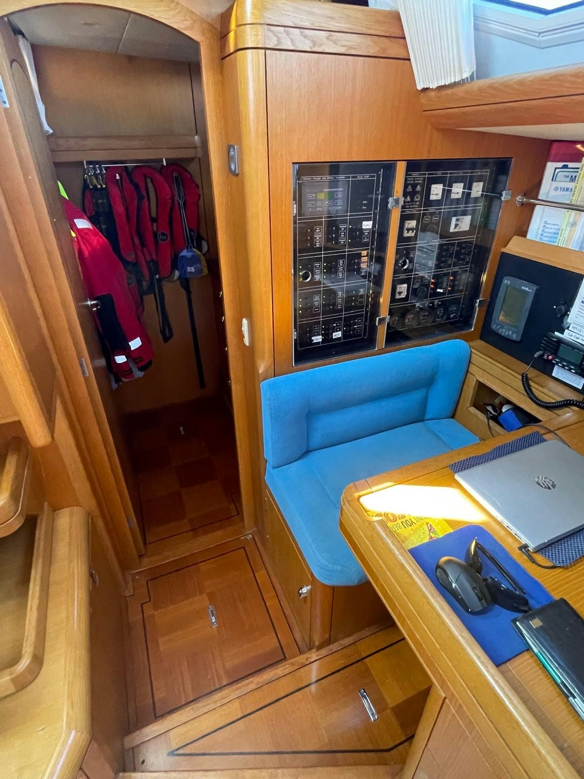 a room with a desk and a chair aboard DREAM AGAIN II Yacht for Sale