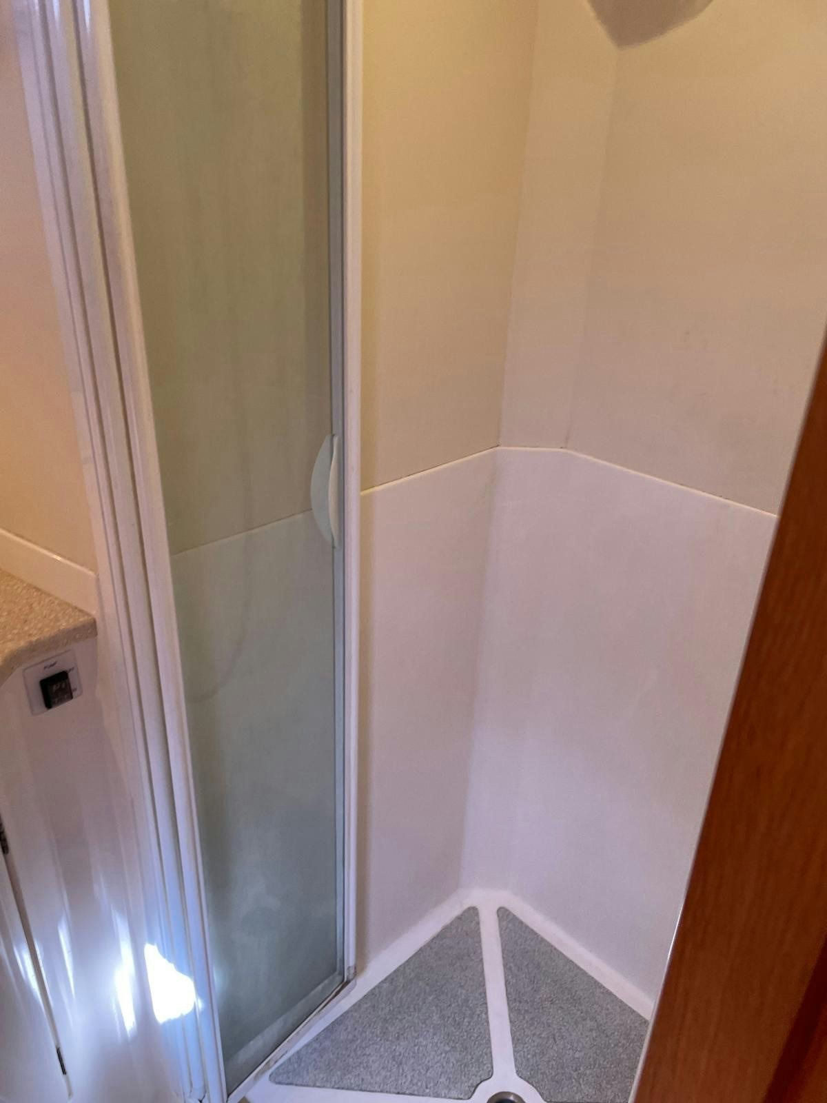 a bathroom with a shower aboard DREAM AGAIN II Yacht for Sale