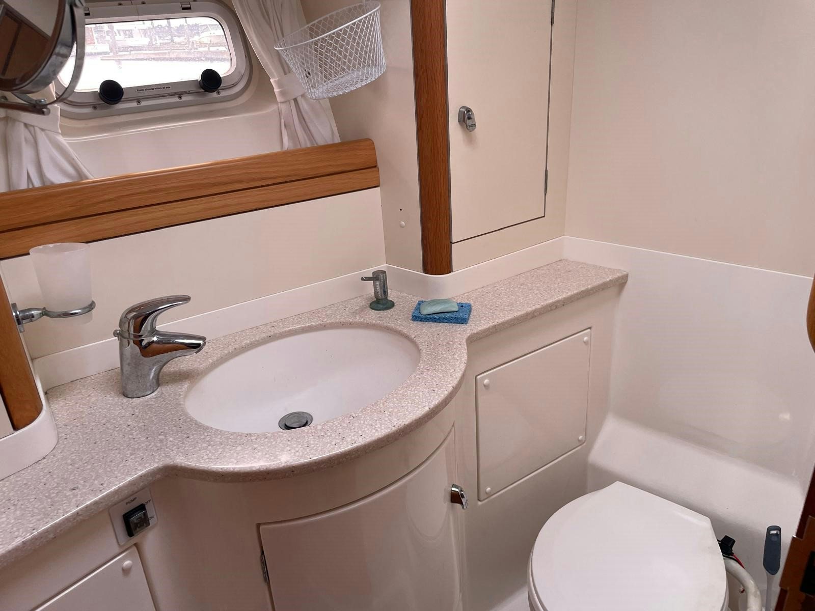 a bathroom with a sink and a toilet aboard DREAM AGAIN II Yacht for Sale