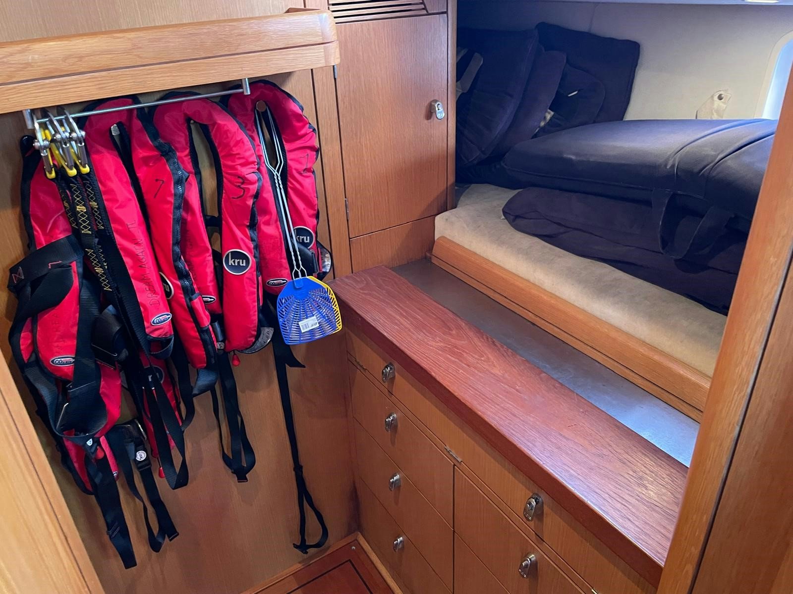 a backpack on a table aboard DREAM AGAIN II Yacht for Sale