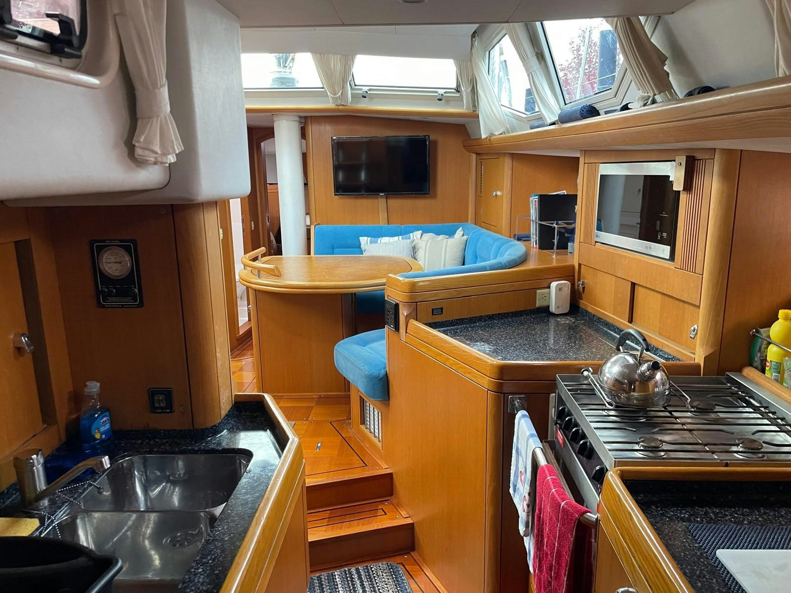 a kitchen with a sink and a stove aboard DREAM AGAIN II Yacht for Sale